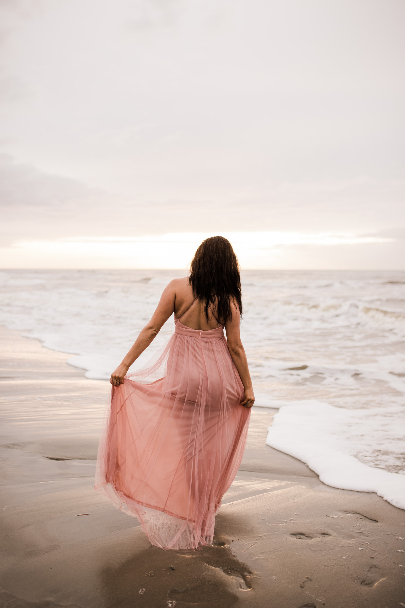 Sunrise portraits at Folly Beach during a sweet engagement session
