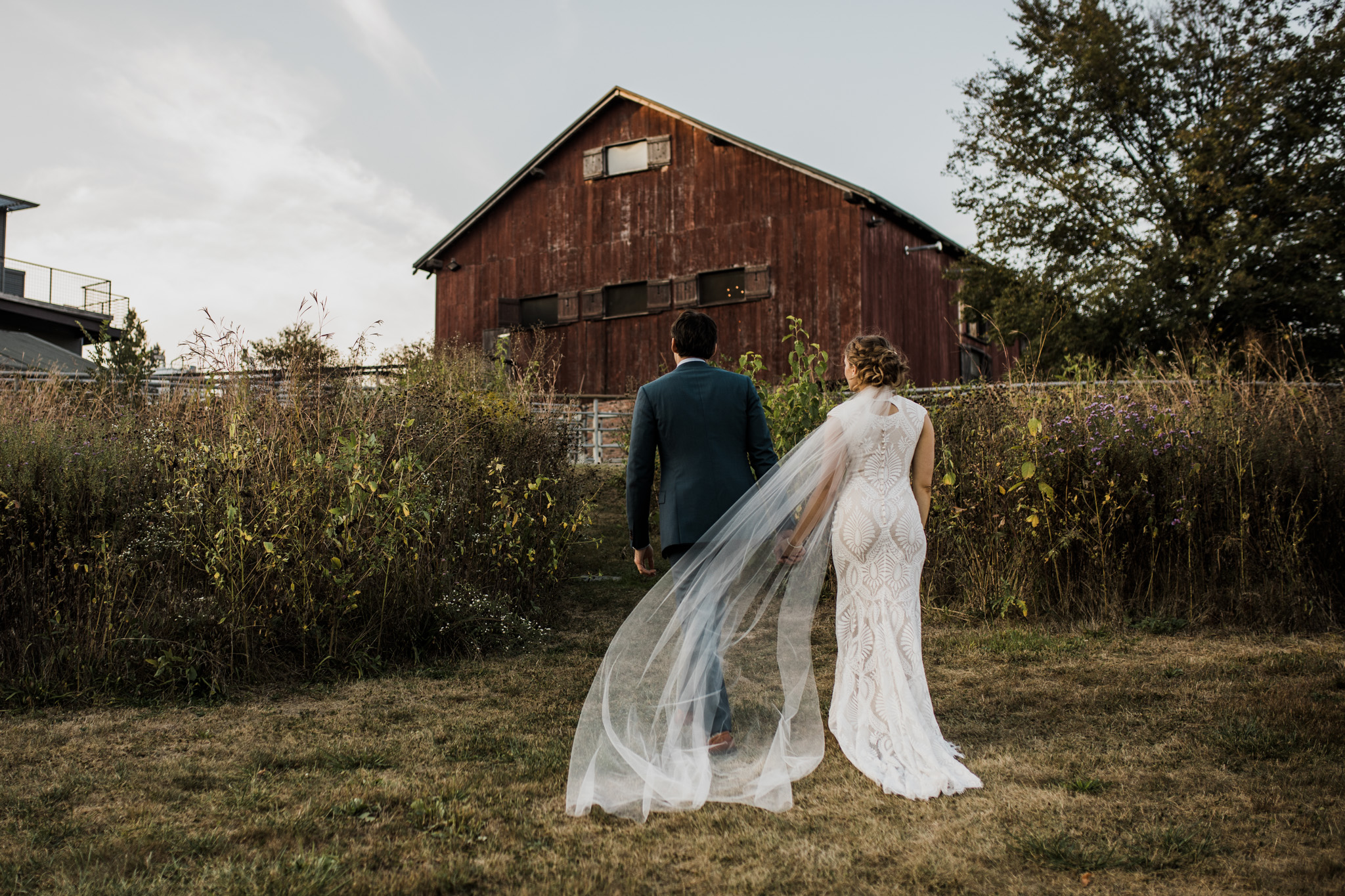 an intimate fall wedding at Tradespoint Creamery during sunset.