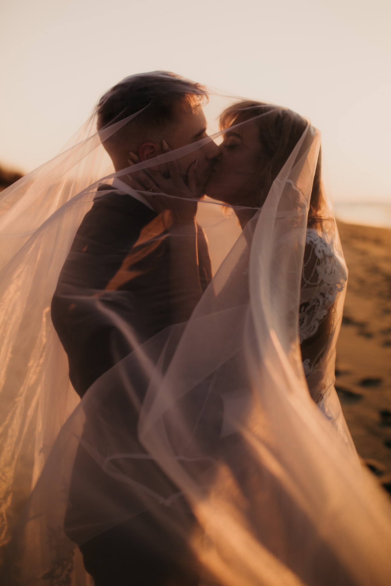 Intimate golden hour portraits with veil