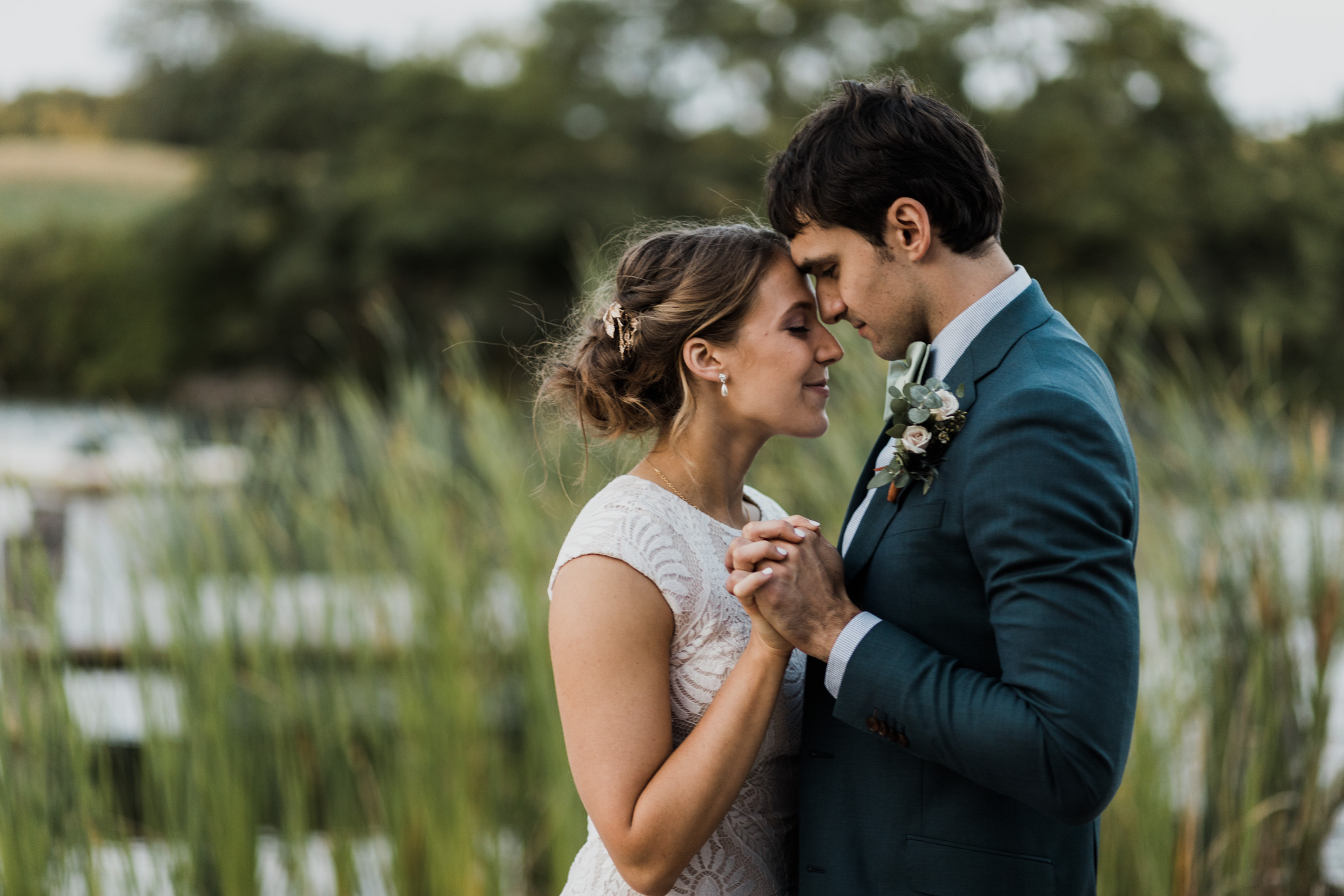 A bride and groom share their first dance during their intimate midwest elopement