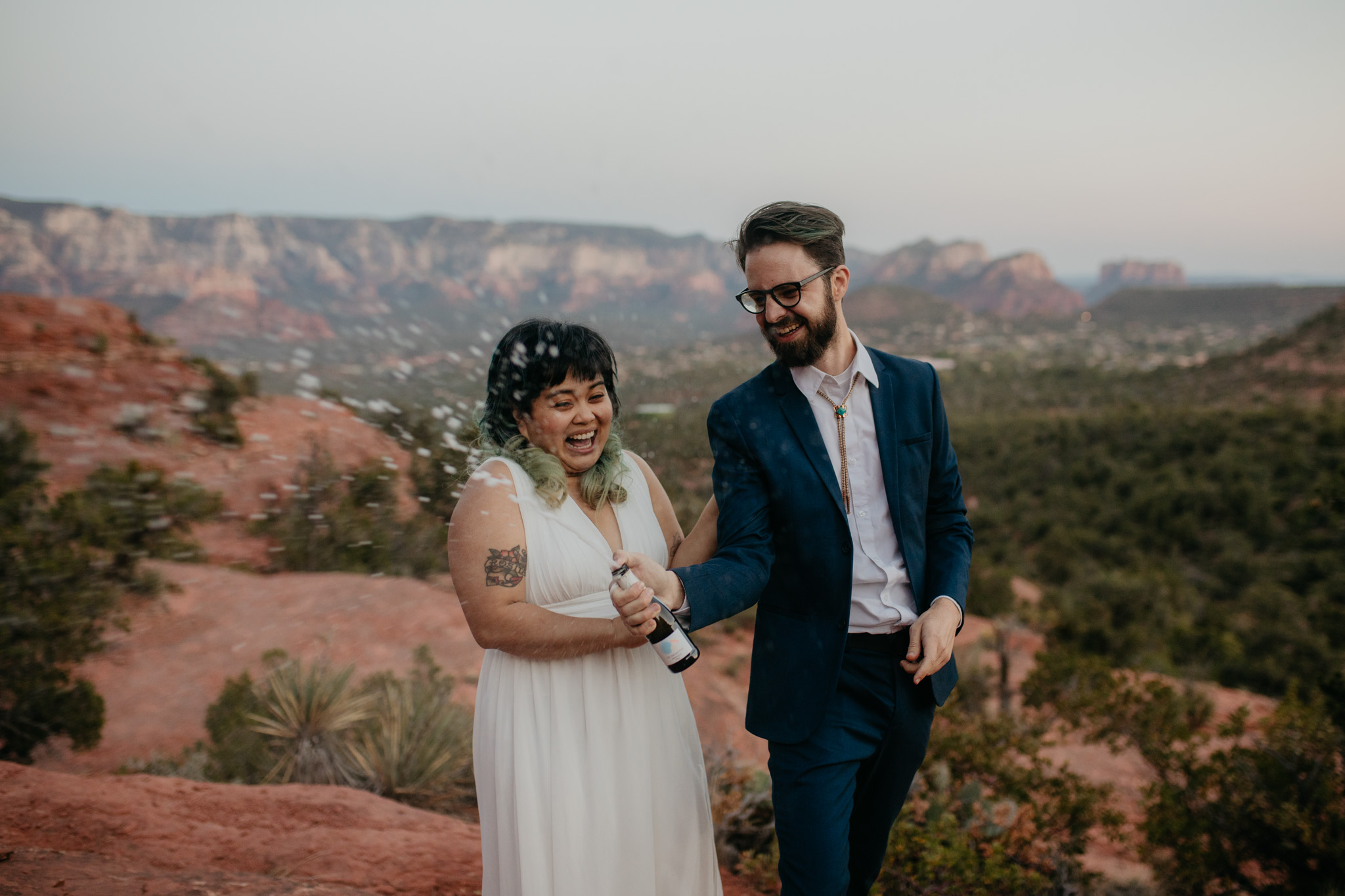 Elopement Activities for a Unique Experience - Popping Champagne
