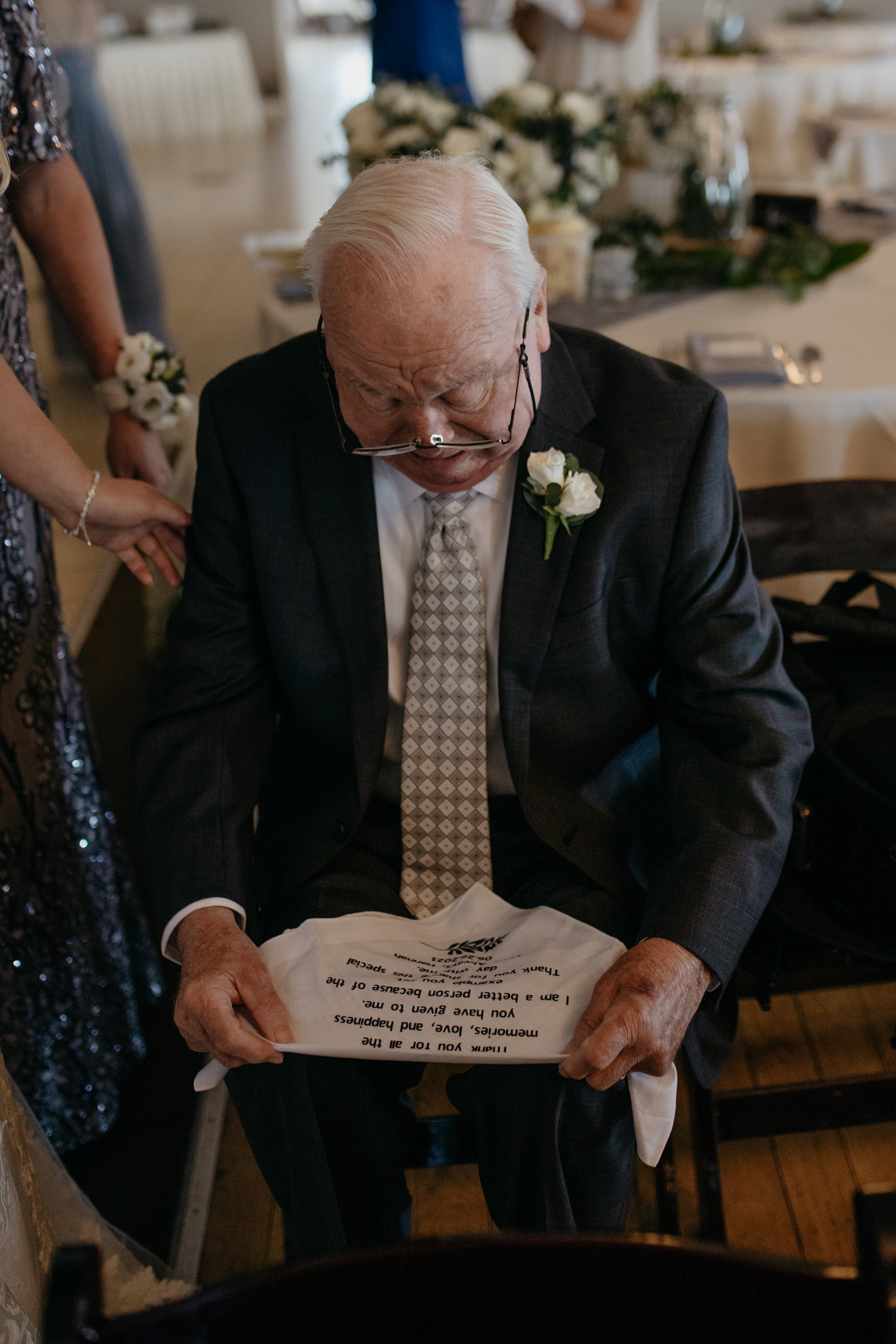 The bride gives her grandpa the sweetest gift during their Indiana wedding