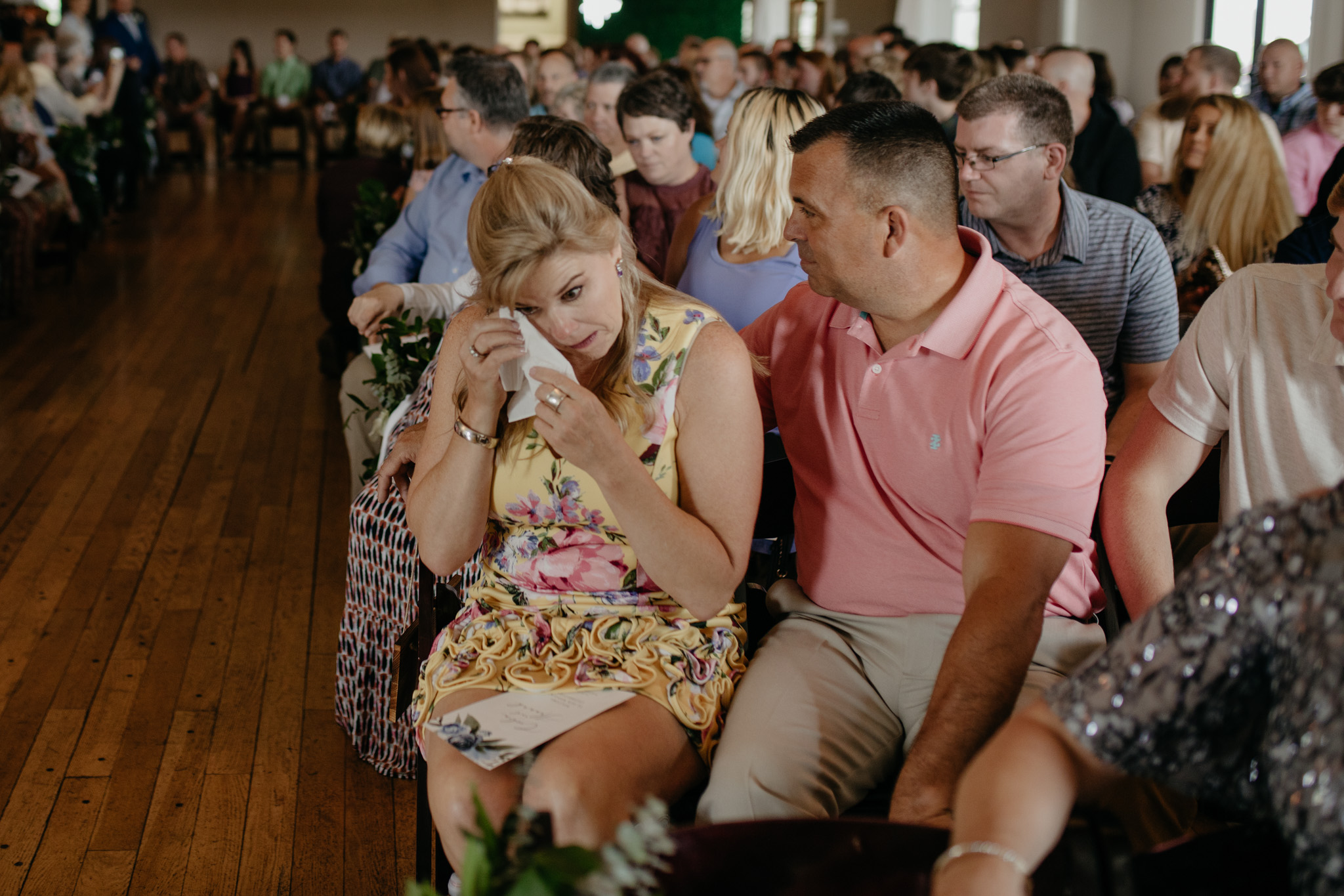 Family wipes tears during this summer Indiana wedding ceremony