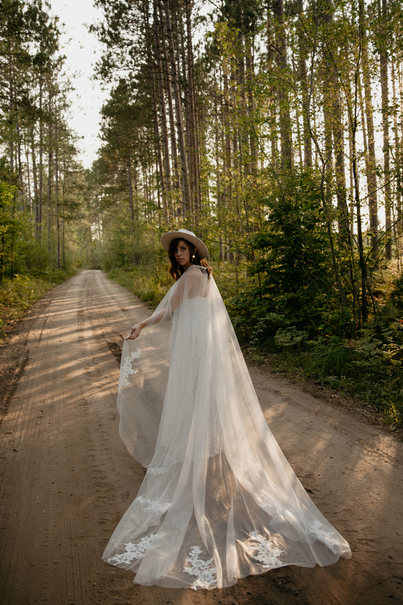 The prettiest boho bride with a wedding cape // Michigan Manistee Forest Elopement