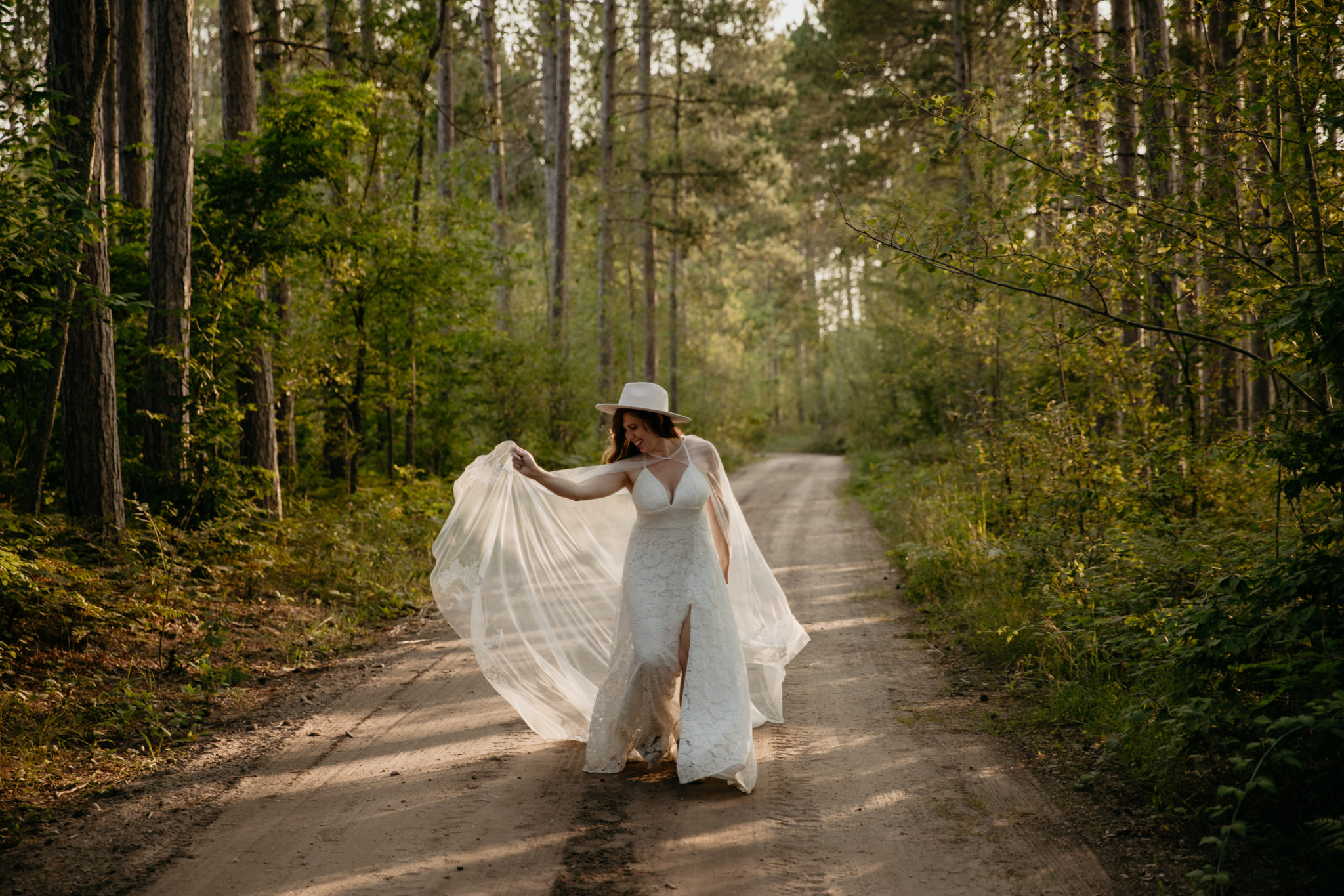 The prettiest boho bride with a wedding cape // Michigan Manistee Forest Elopement