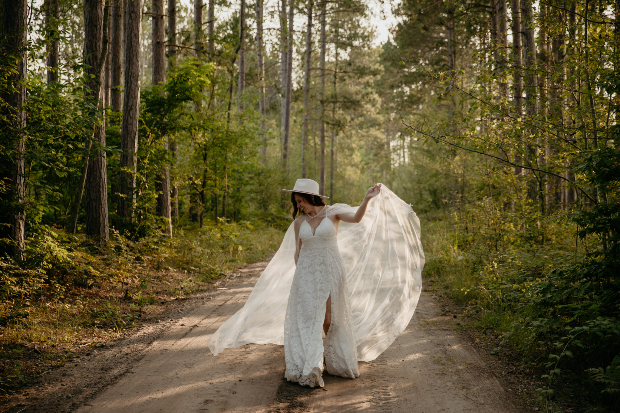 The prettiest boho bride with a wedding cape // Michigan Manistee Forest Elopement