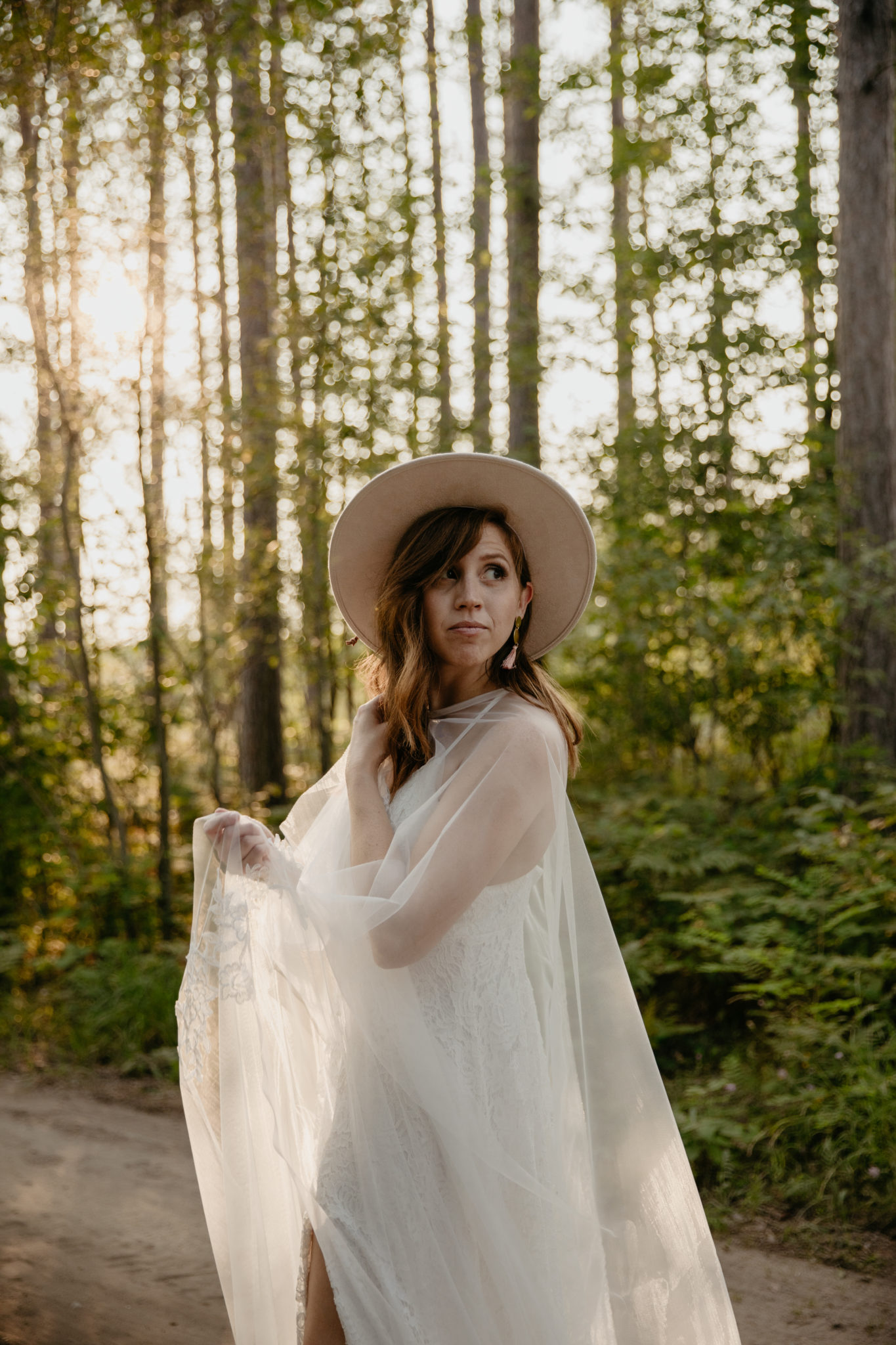 The prettiest boho bride with a wedding cape // Michigan Manistee Forest Elopement