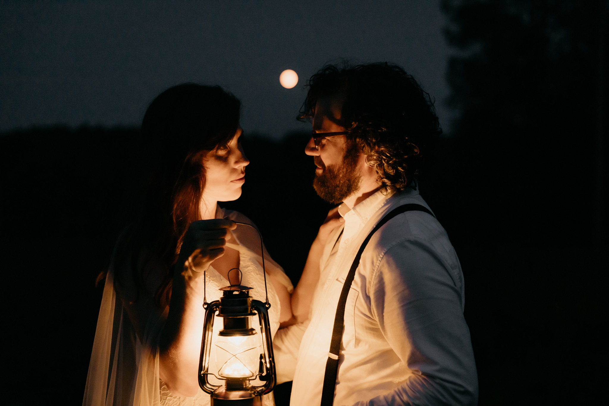 Full moon and lantern portraits during this Michigan summer elopement