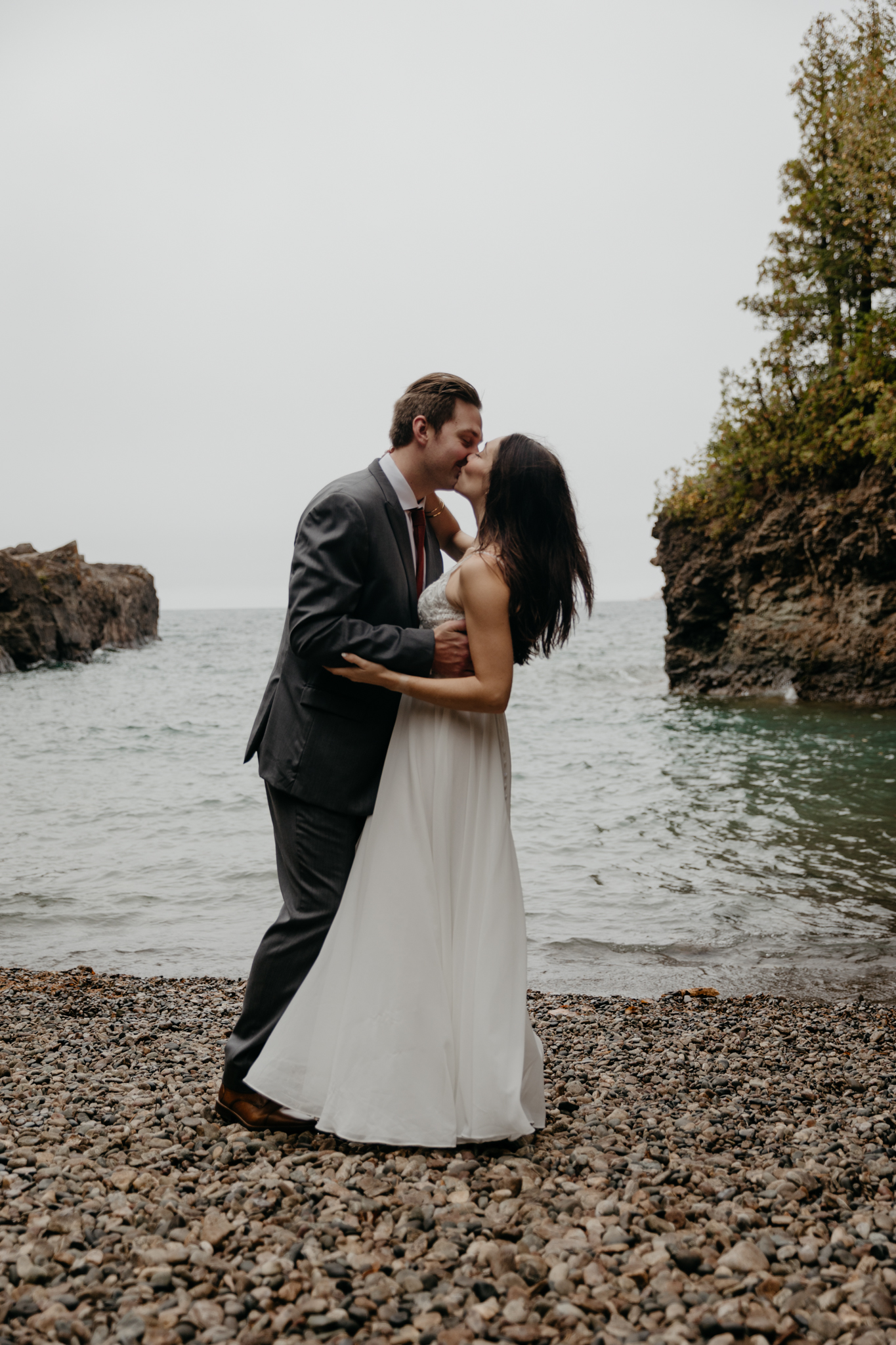 The dreamiest moody elopement ceremony at Presque Isle Park, Michigan
