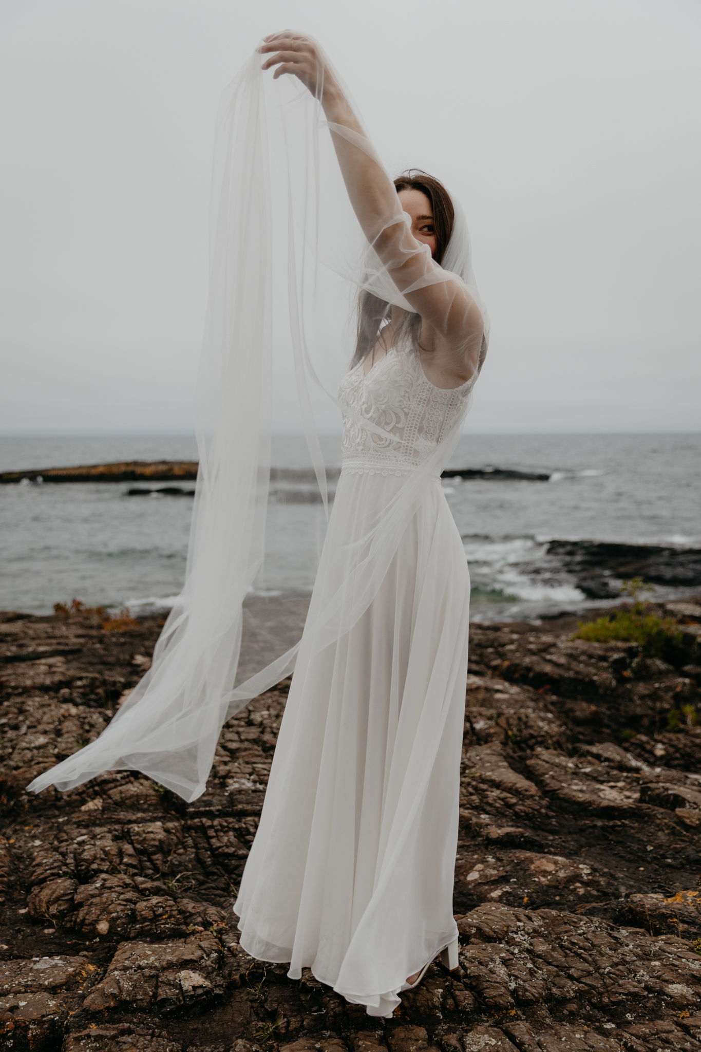 This Michigan Elopement at Presque Isle Park is a moody dream