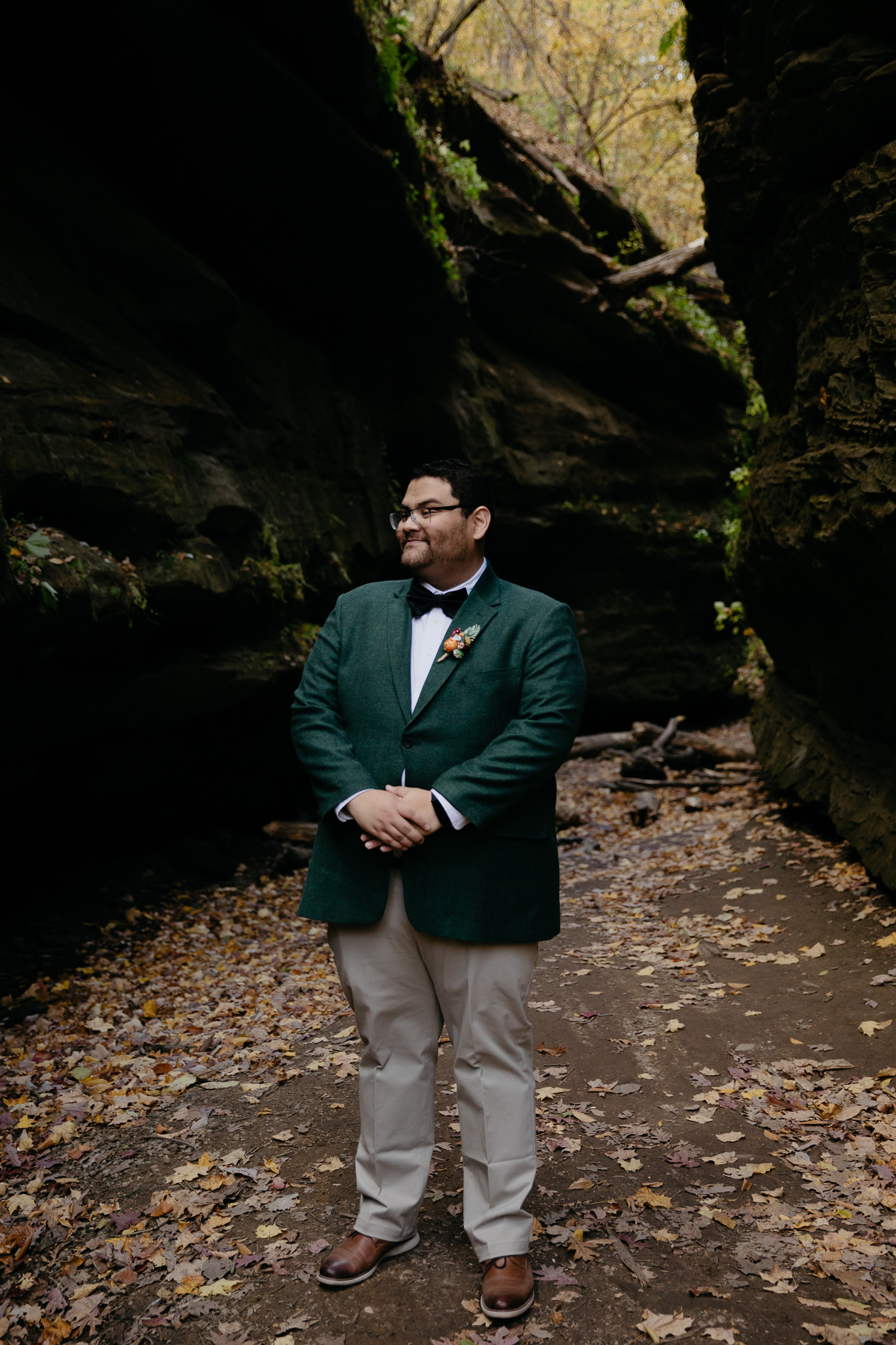 A groom standing in Bear Canyon at Turkey Run State Park, Indiana