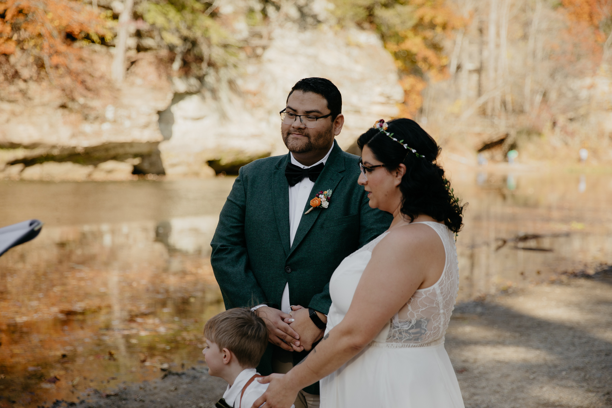 A couple eloping at Turkey Run State Park, shares vows overlooking Sugar Creek
