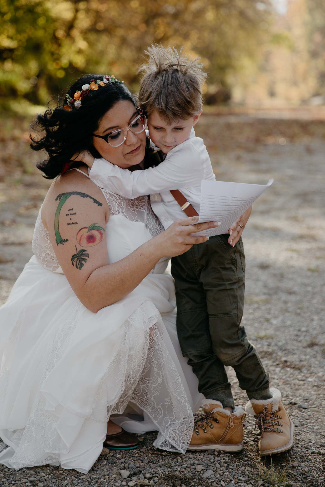 A mother shares vows with her son at her fall elopement at Turkey Run State Park