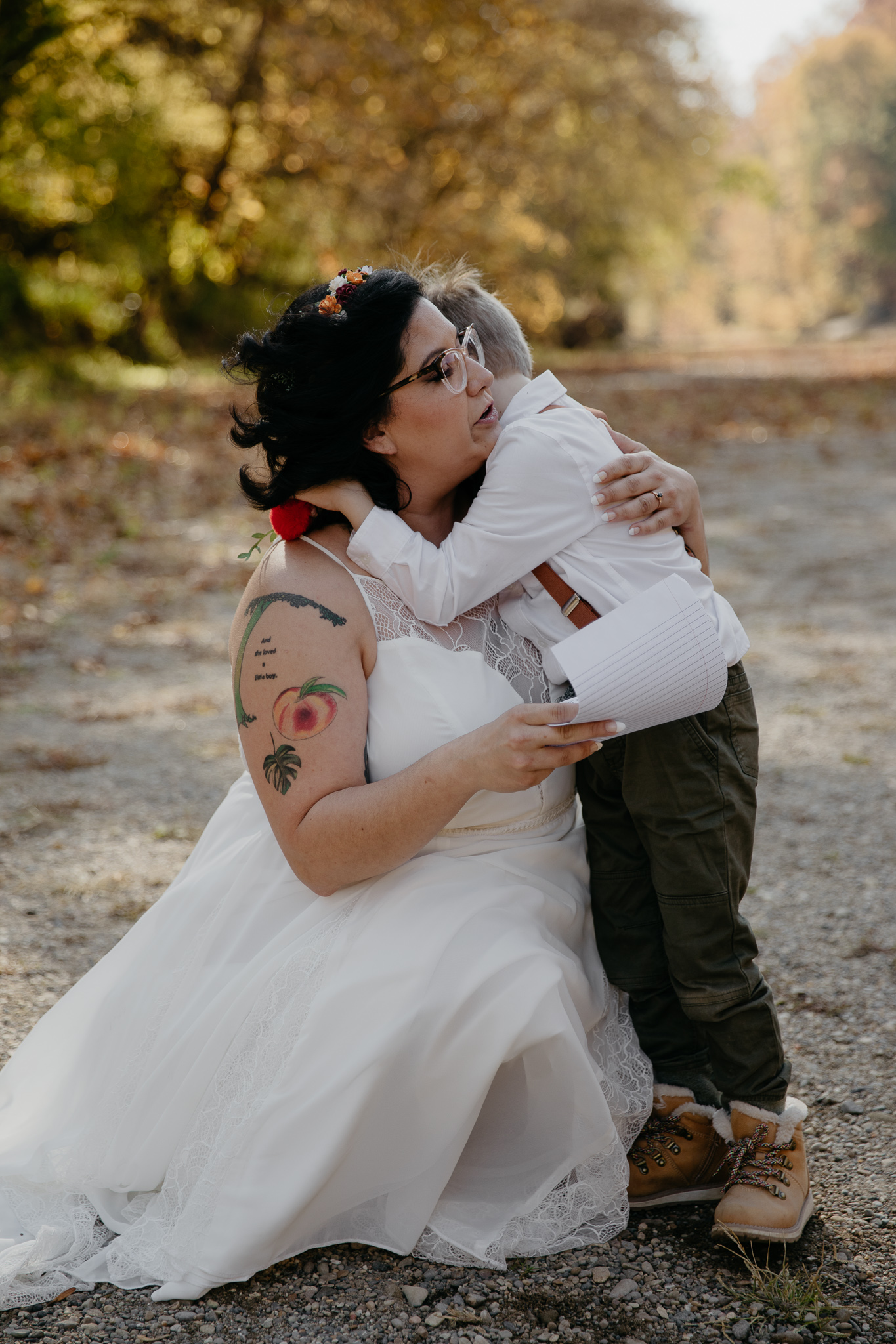 A mother shares vows with her son at her fall elopement at Turkey Run State Park