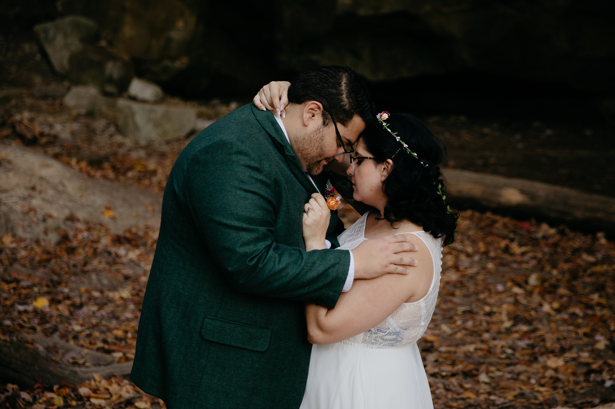 Bride and groom embracing at the Icebox, in Turkey Run State park after their elopement