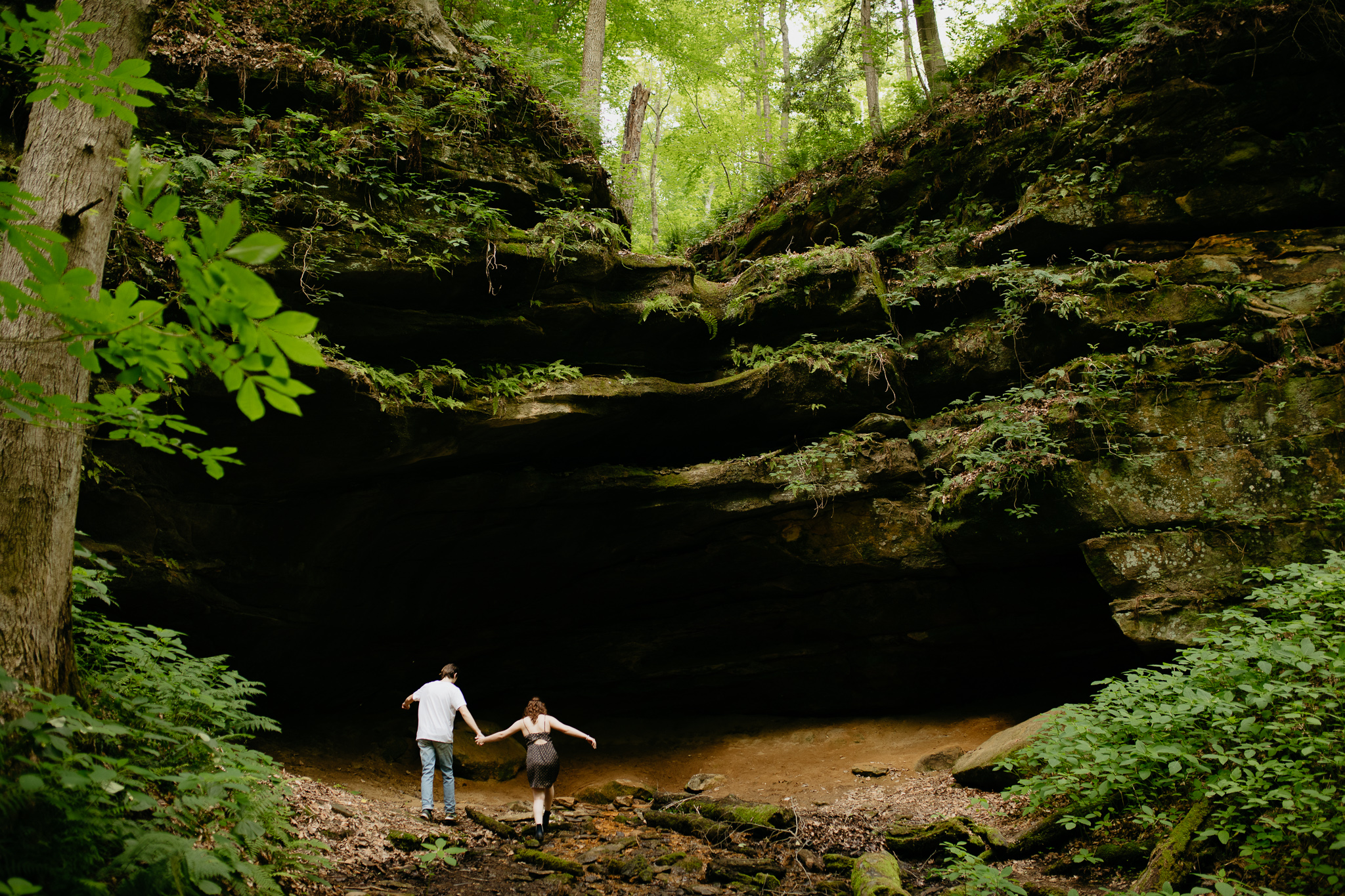 Engagement Session at Shades State Park, Indiana, exploring caves and lush green canyons