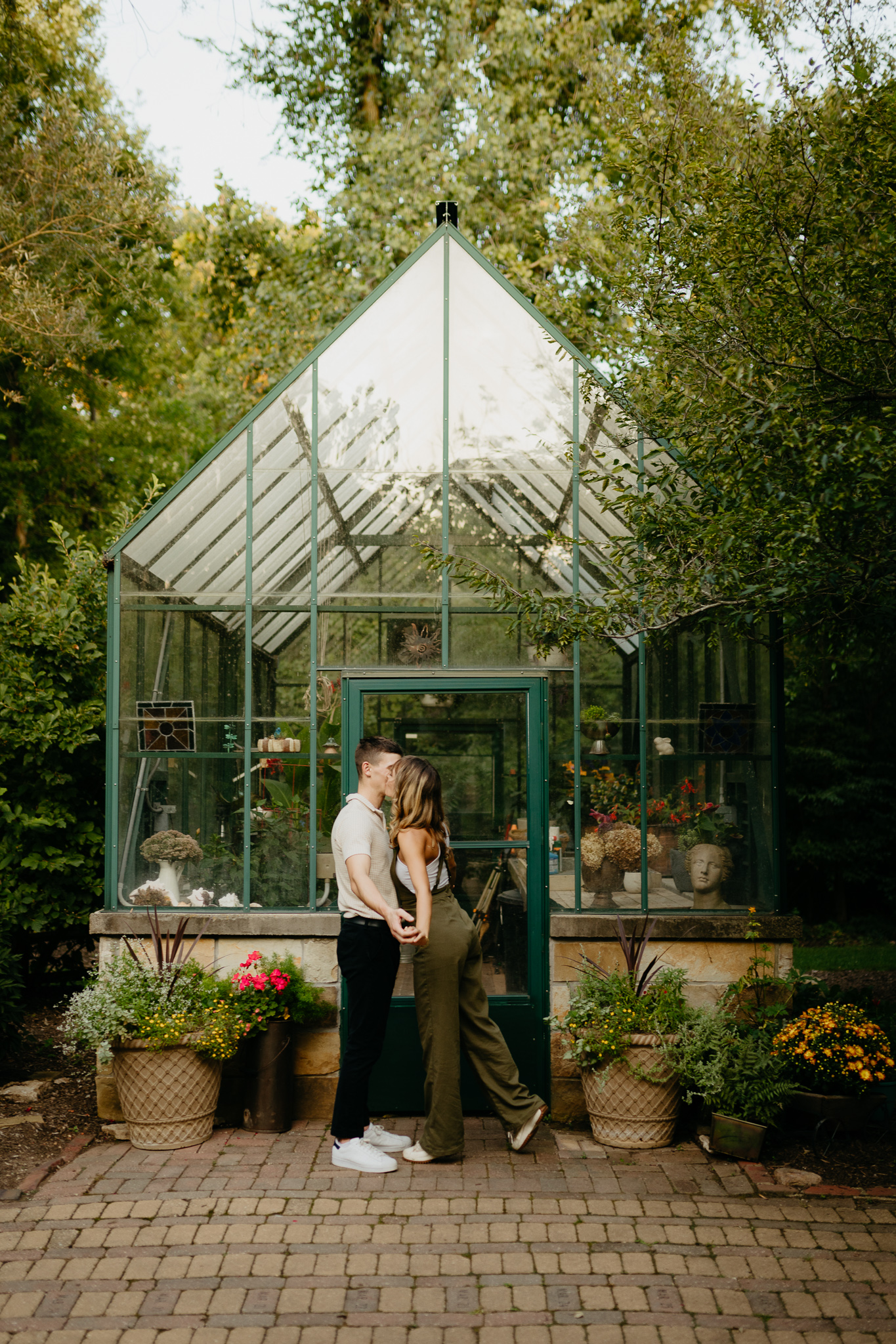 Defries Gardens Indiana couple photos || Wes Anderson Inspired Greenhouse Photos