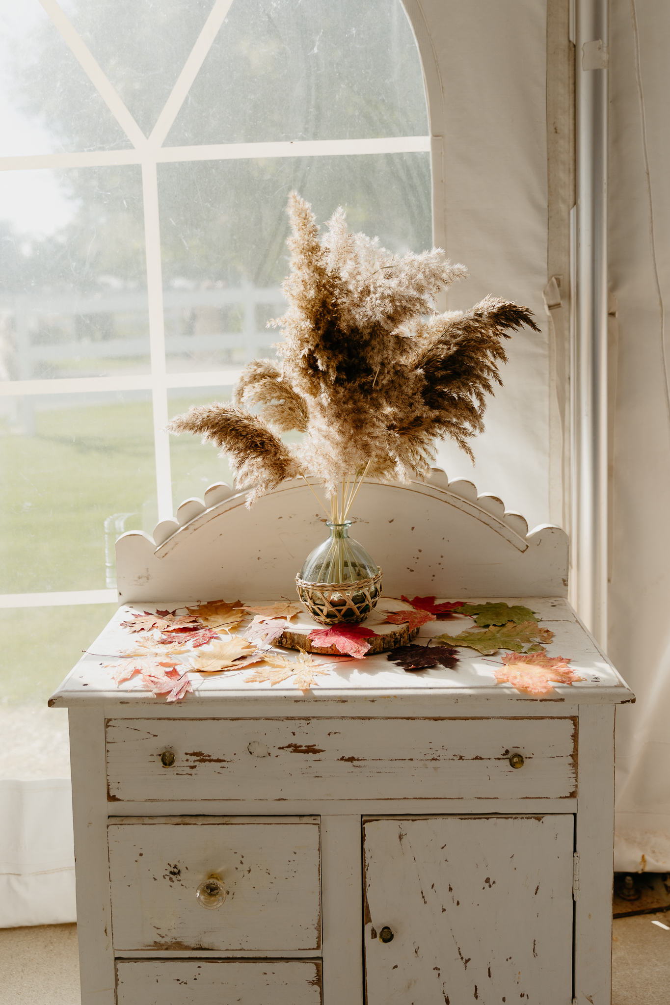 Wedding decorations and guest book on a table for a fall wedding