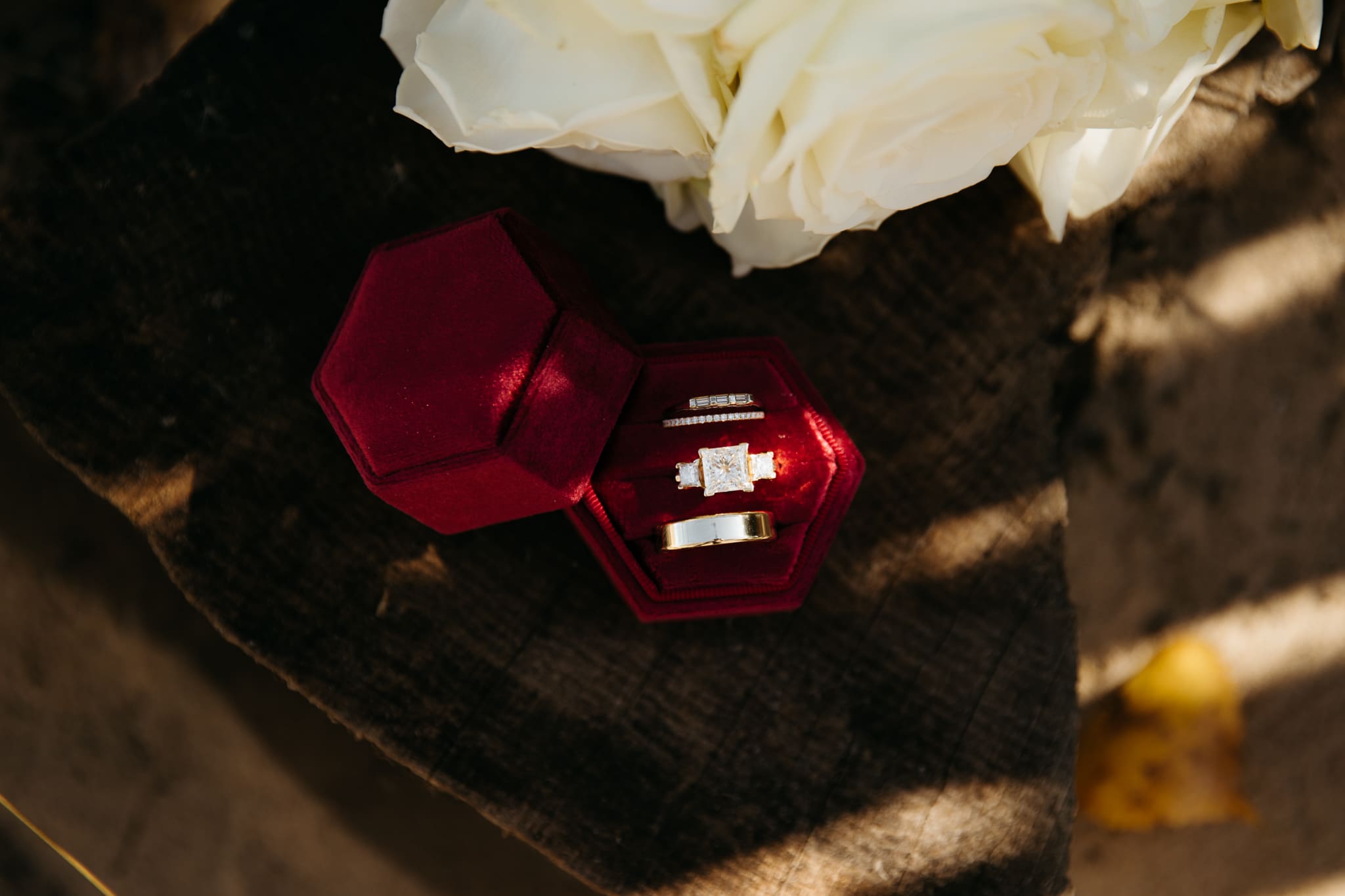 Wedding invitation, rings, and details for an Indiana Dunes intimate wedding along Lake Michigan