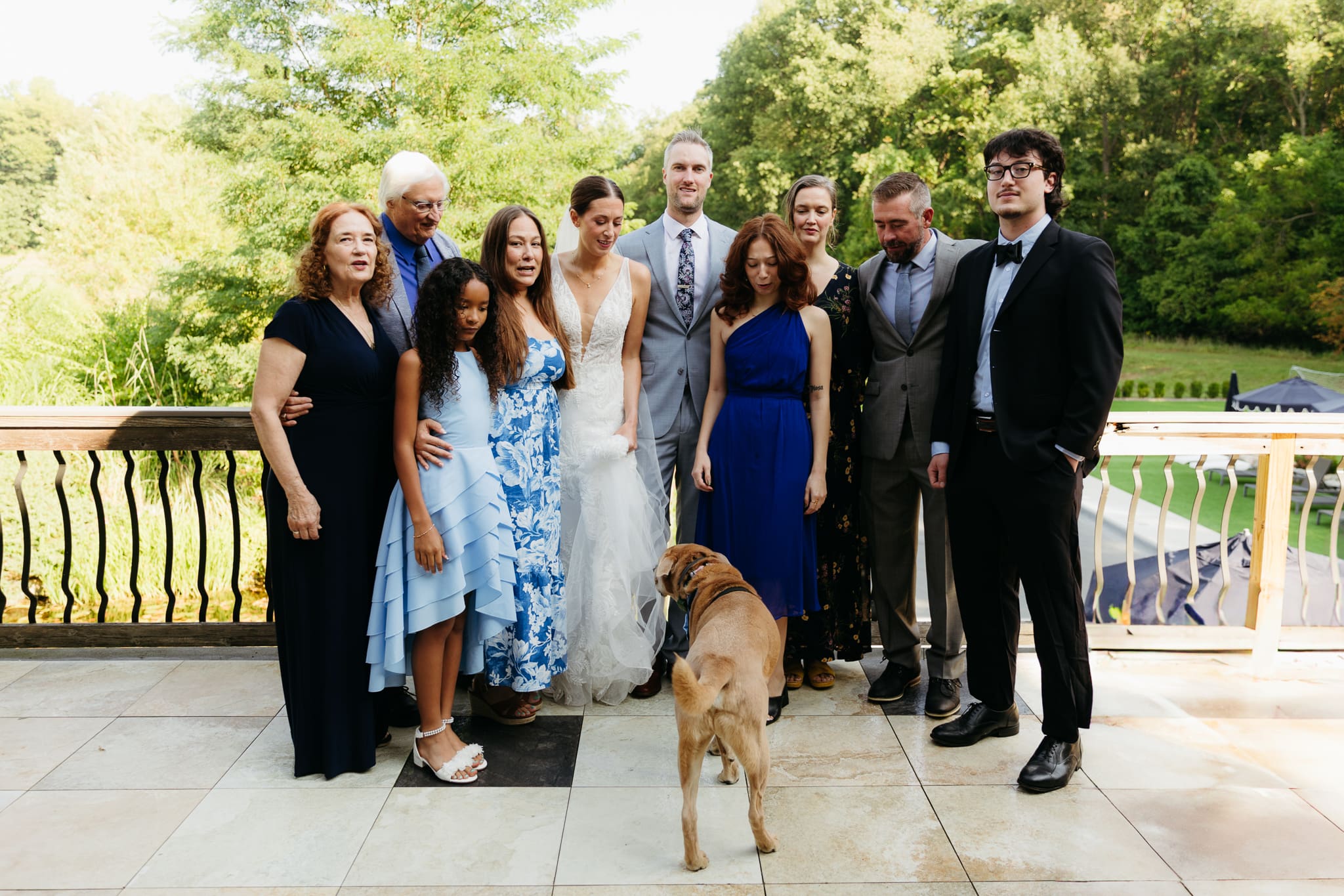 Formal group and family photos taken outdoors before the Lake Michigan Elopement ceremony