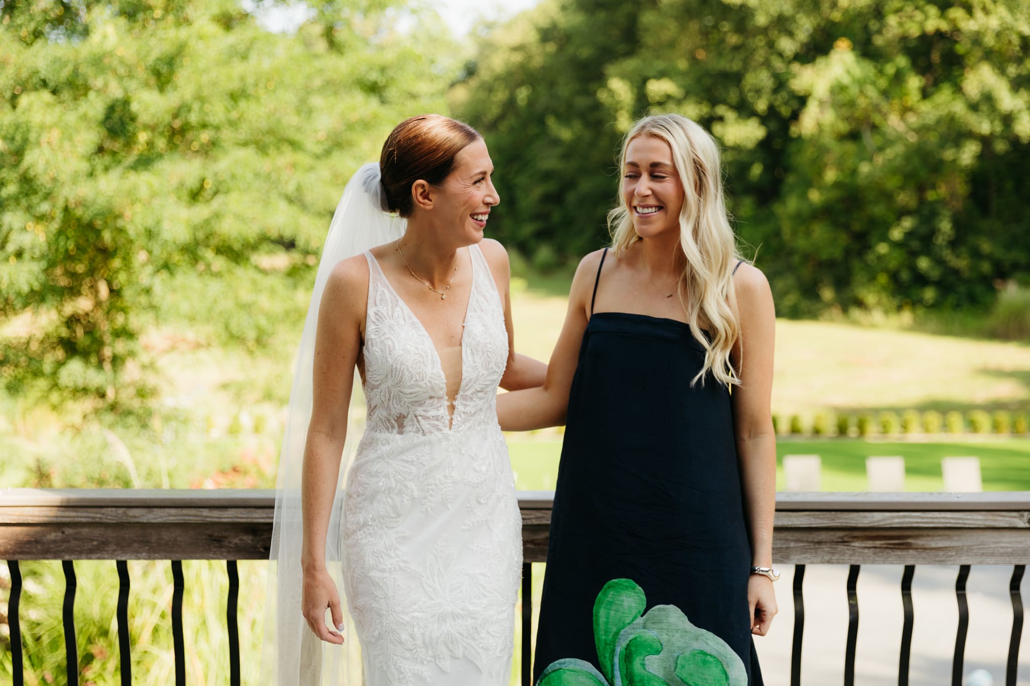 Formal group and family photos taken outdoors before the Lake Michigan Elopement ceremony