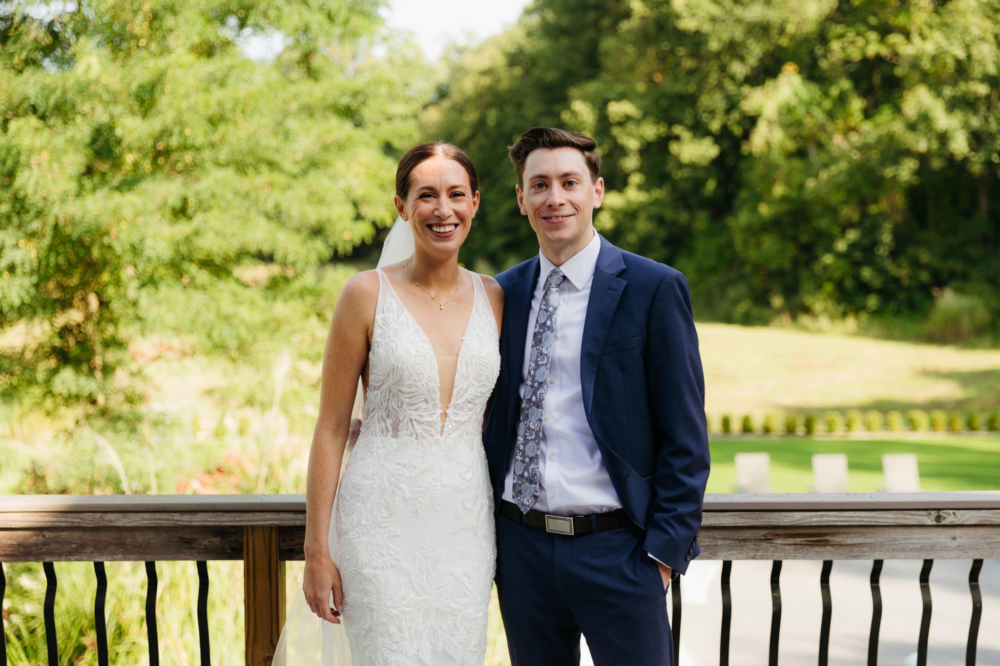 Formal group and family photos taken outdoors before the Lake Michigan Elopement ceremony