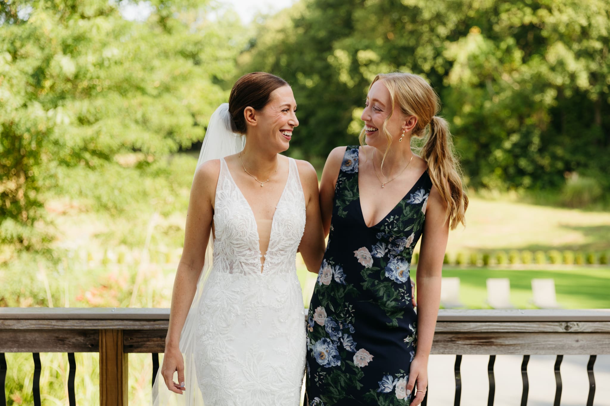 Formal group and family photos taken outdoors before the Lake Michigan Elopement ceremony