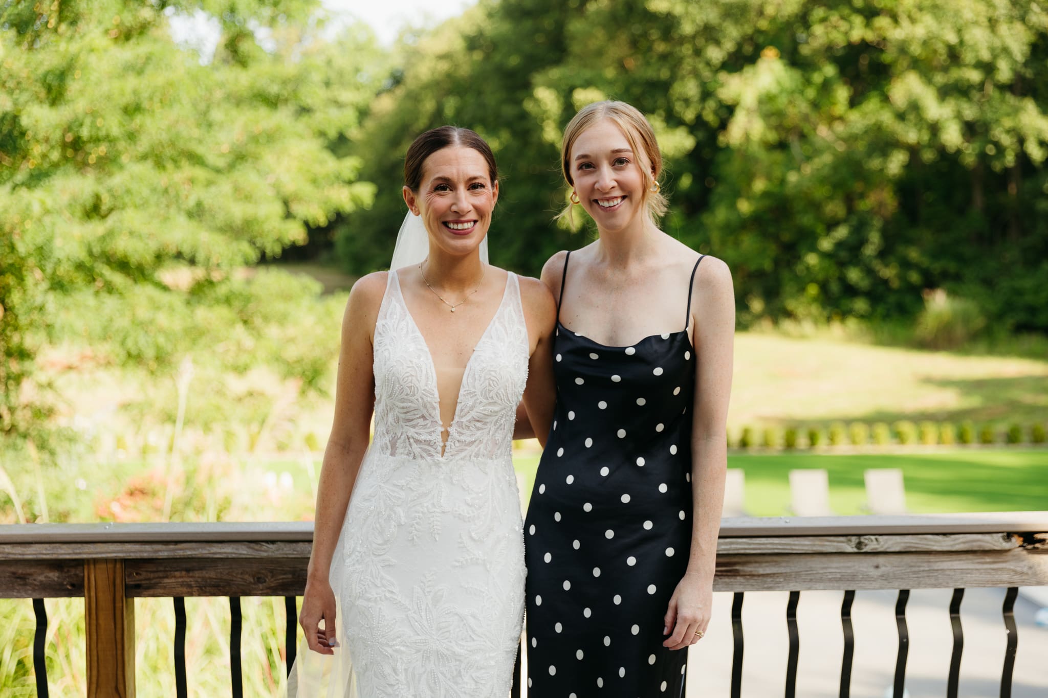 Formal group and family photos taken outdoors before the Lake Michigan Elopement ceremony
