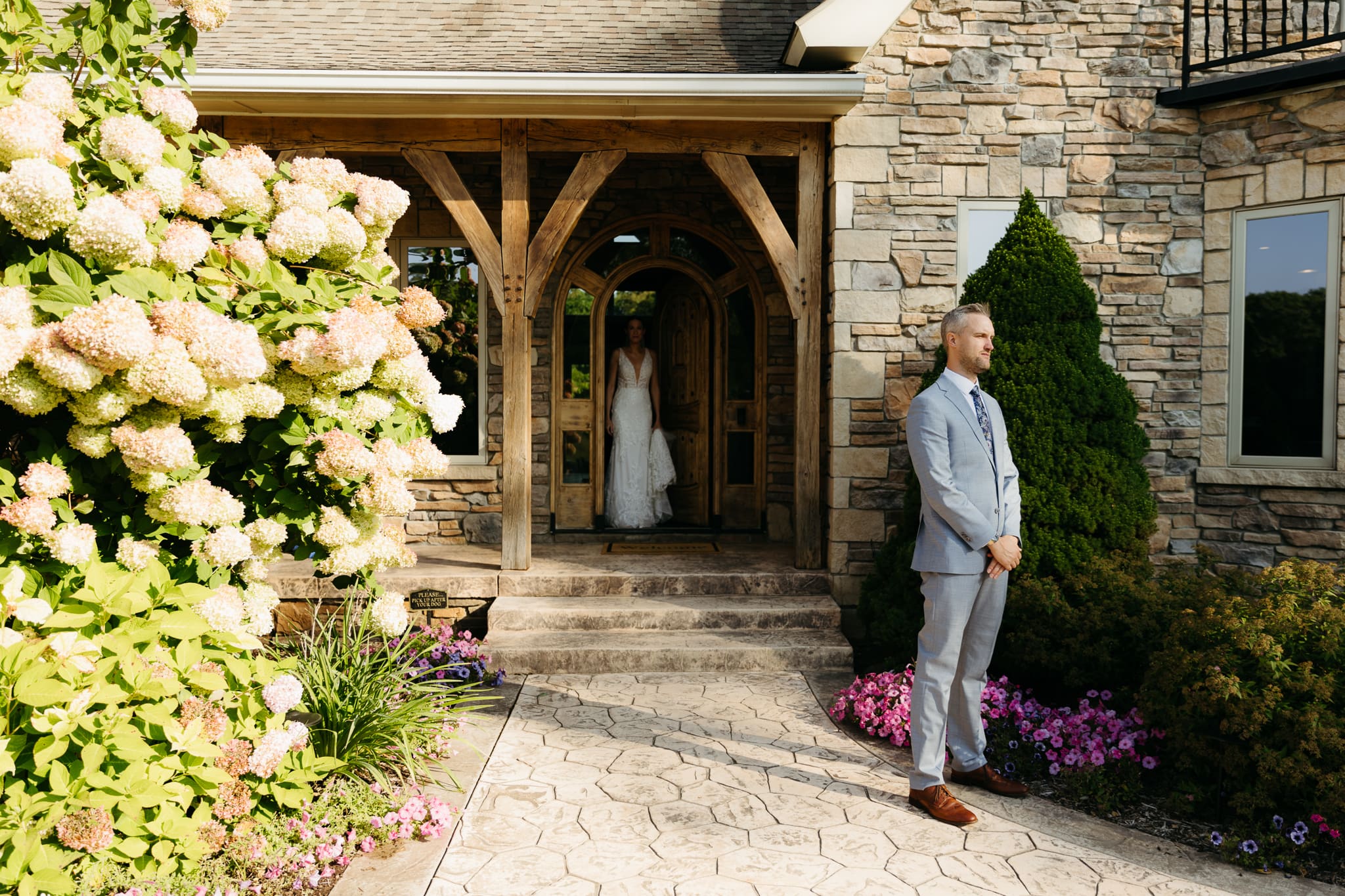 A bride and groom share a first look before their beach elopement ceremony at Warren Dunes State Park