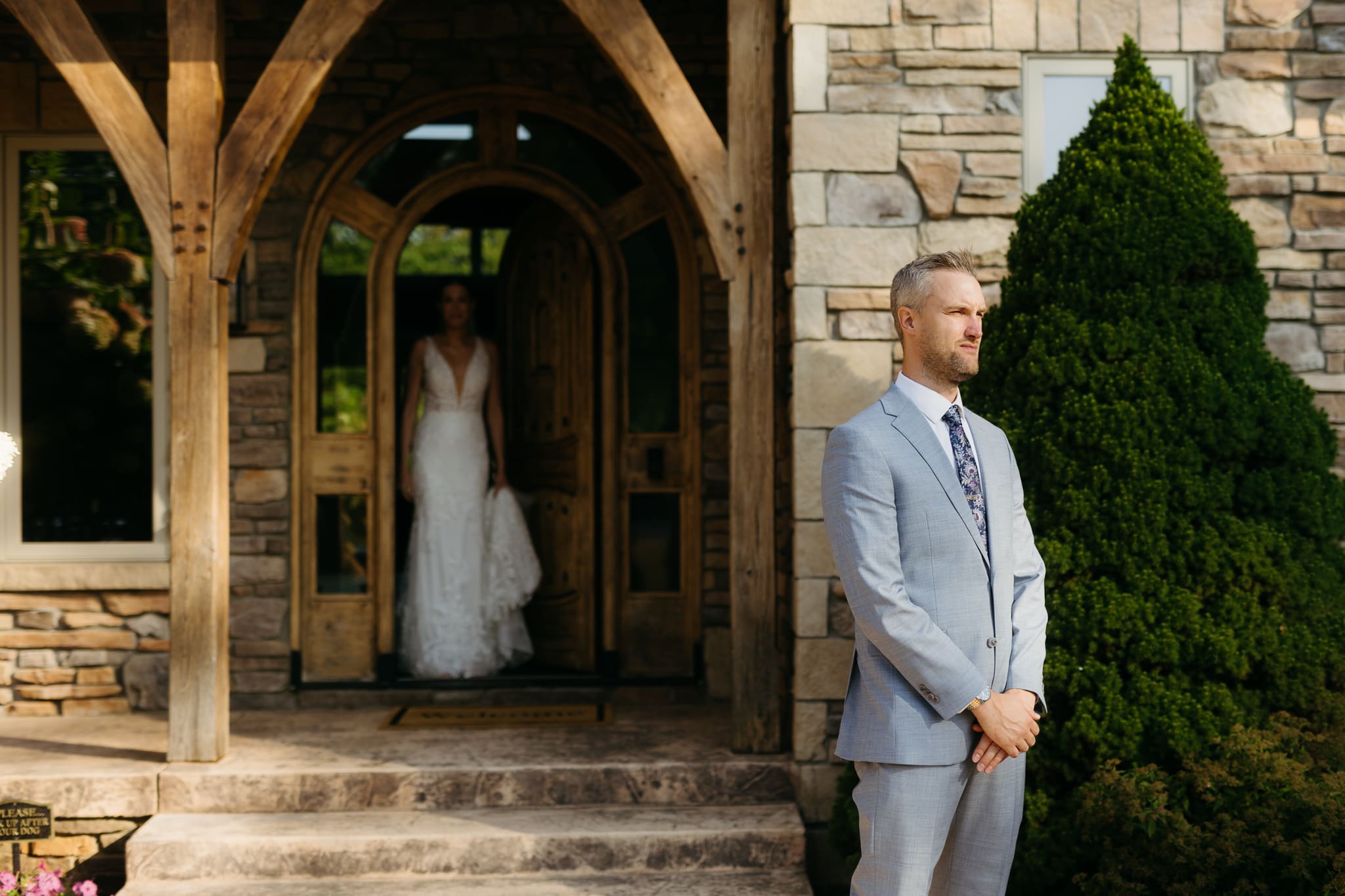 A bride and groom share a first look before their beach elopement ceremony at Warren Dunes State Park