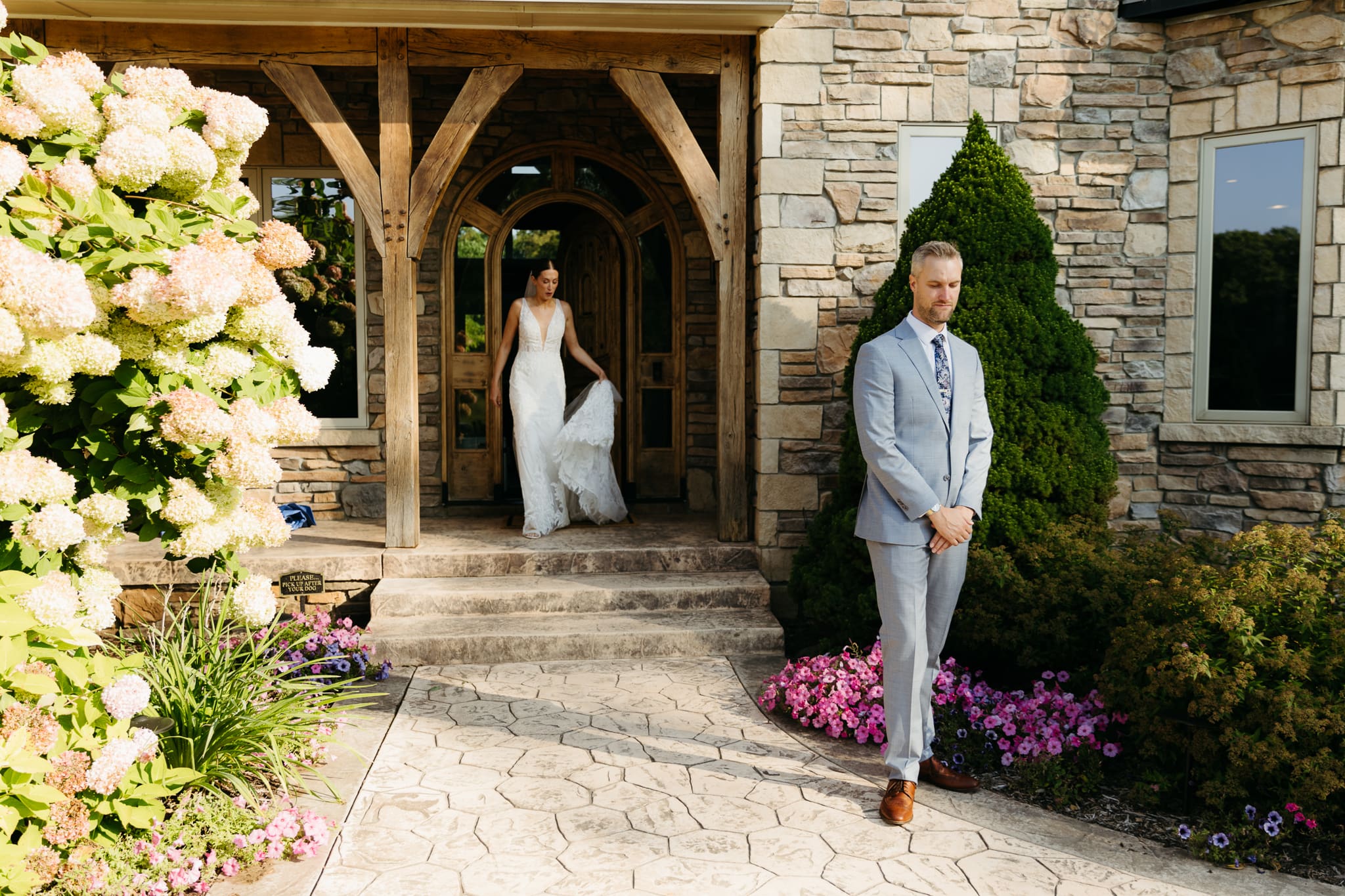 A bride and groom share a first look before their beach elopement ceremony at Warren Dunes State Park