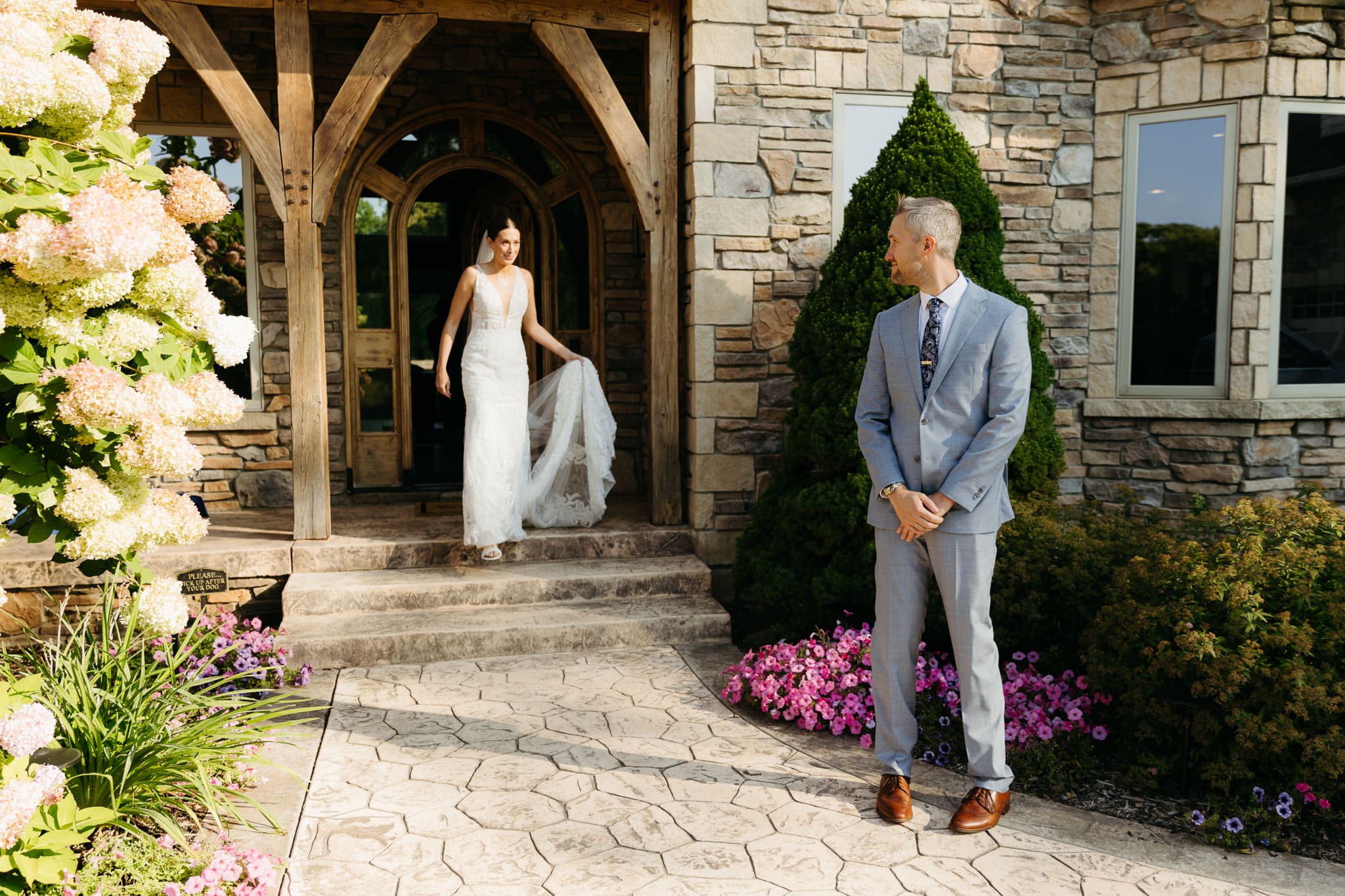 A bride and groom share a first look before their beach elopement ceremony at Warren Dunes State Park