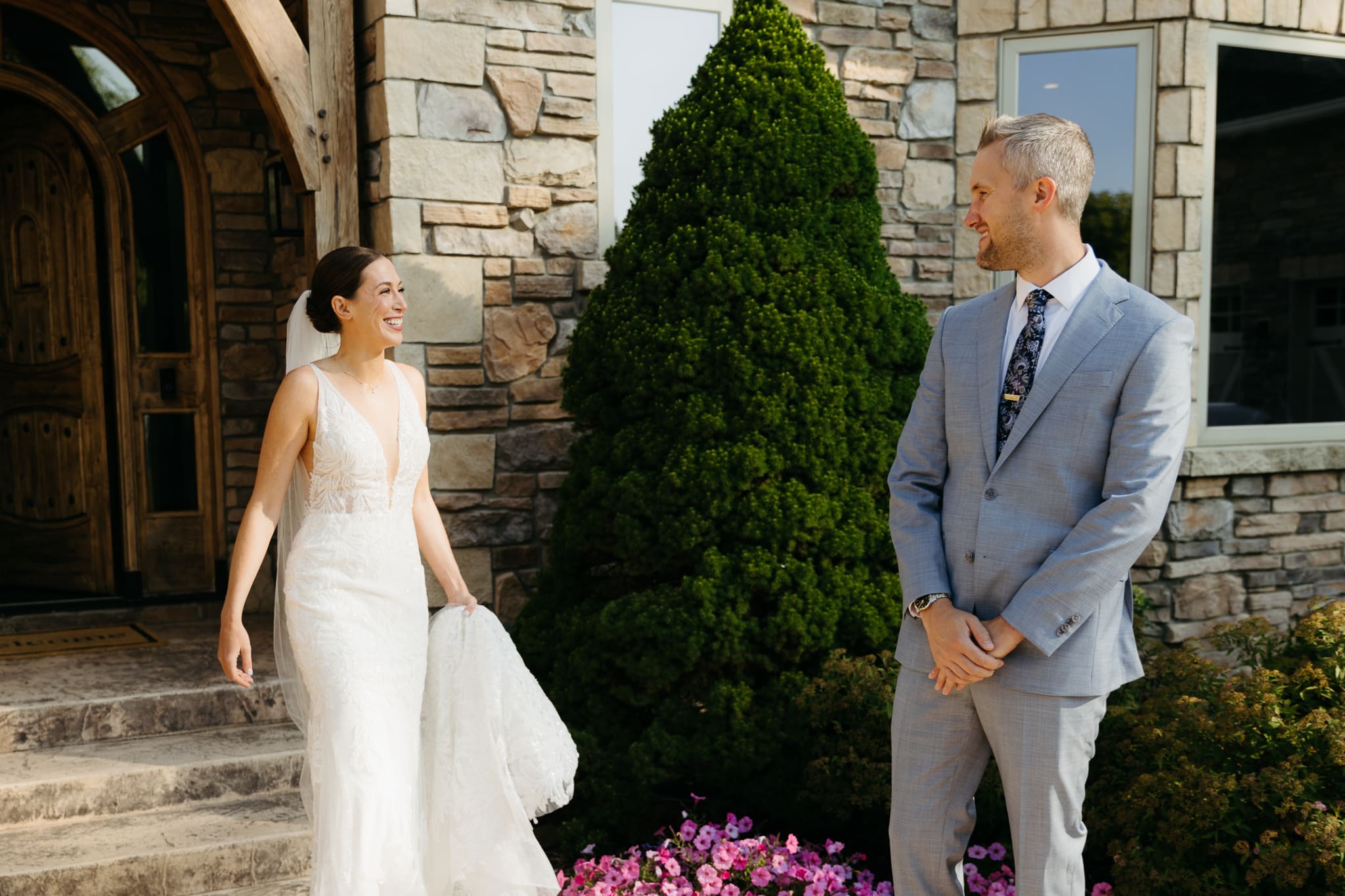A bride and groom share a first look before their beach elopement ceremony at Warren Dunes State Park