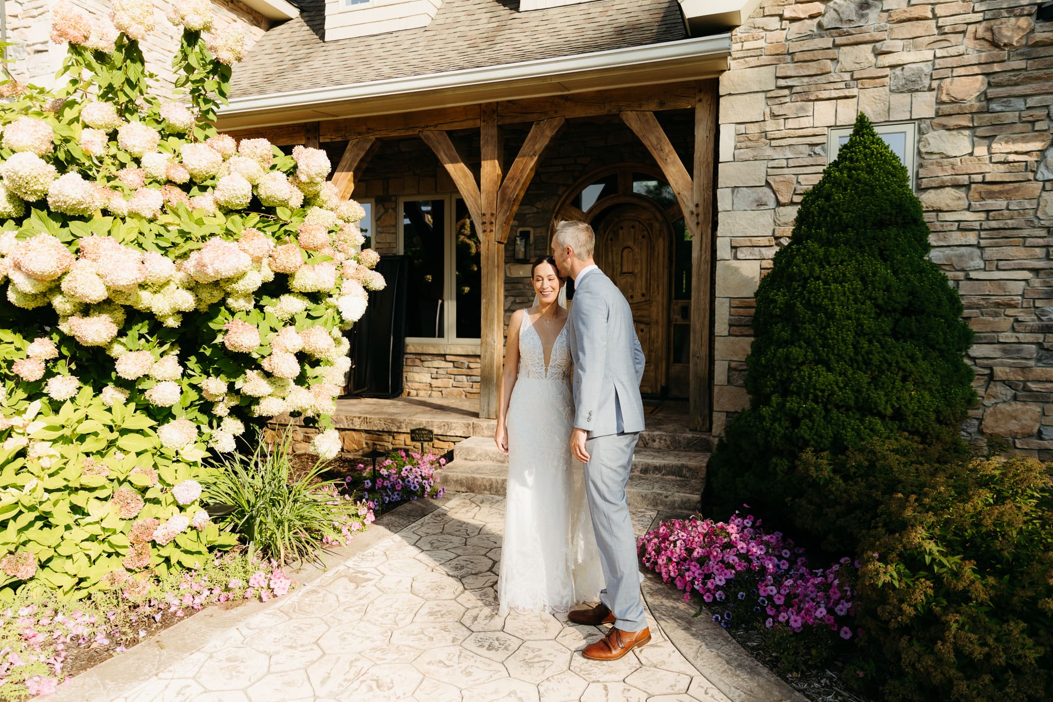 A bride and groom share a first look before their beach elopement ceremony at Warren Dunes State Park