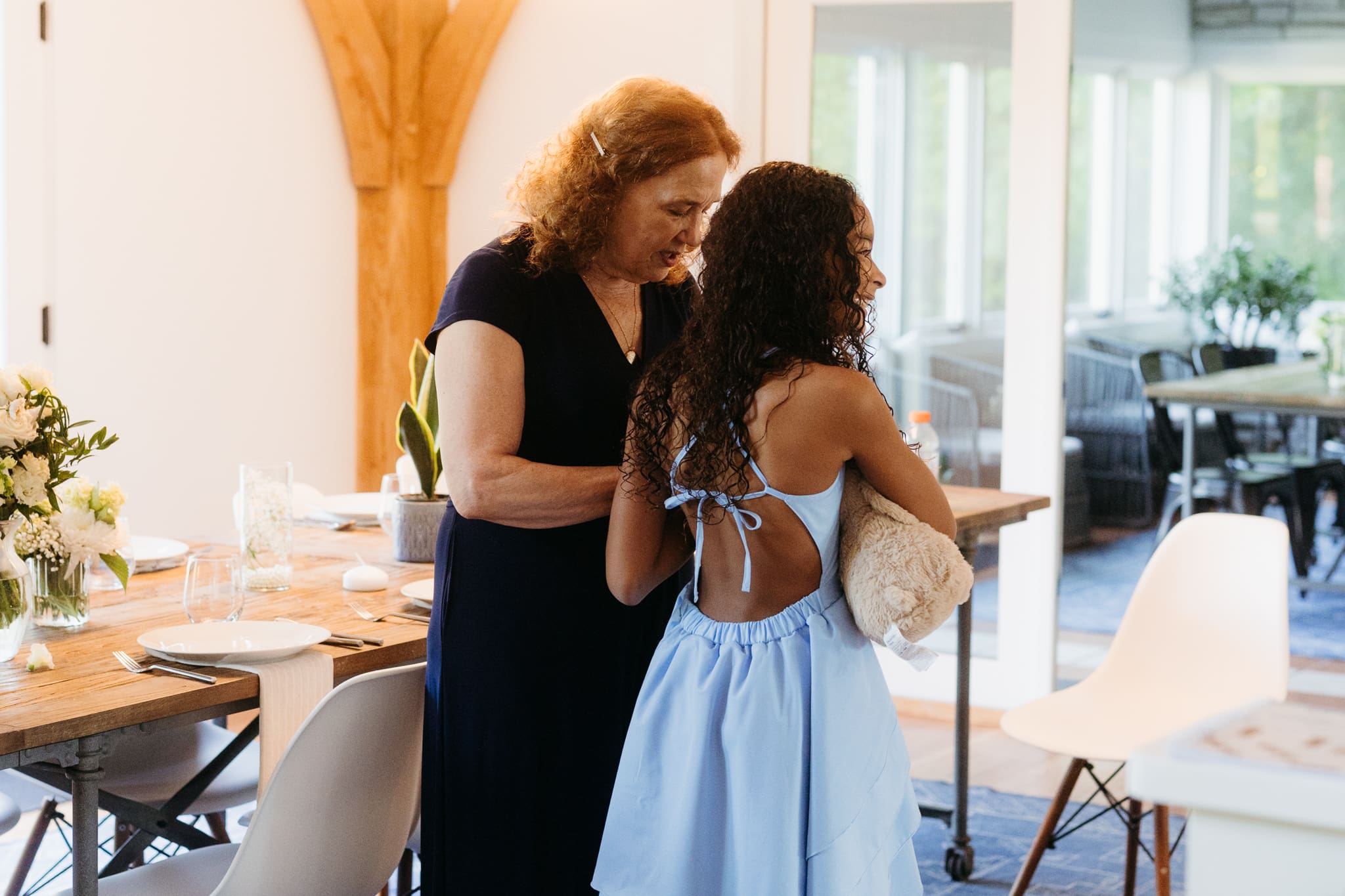 Group and family photos with bride and groom, hanging out at airbnb before heading out for the Lake Michigan wedding ceremony