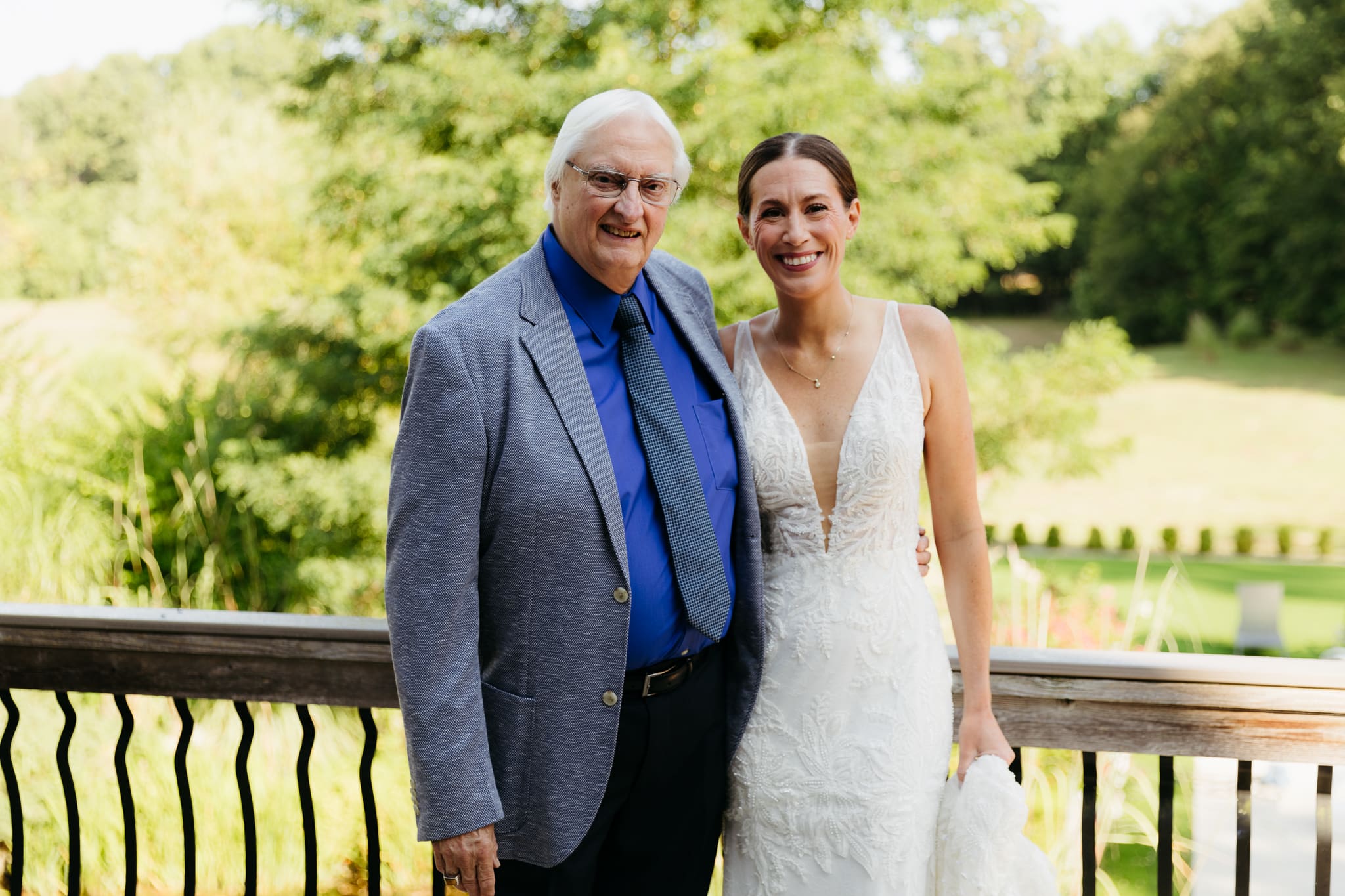 Formal group and family photos taken outdoors before the Lake Michigan Elopement ceremony