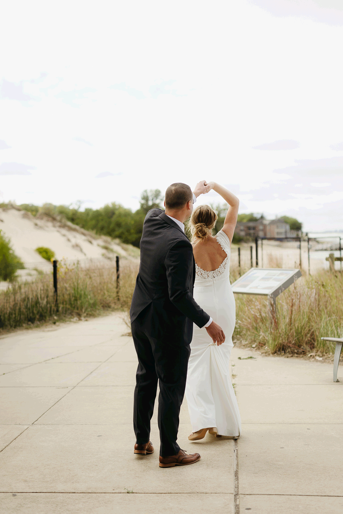 Bride and groom share a first dance during their wedding at Indiana Dunes National Park