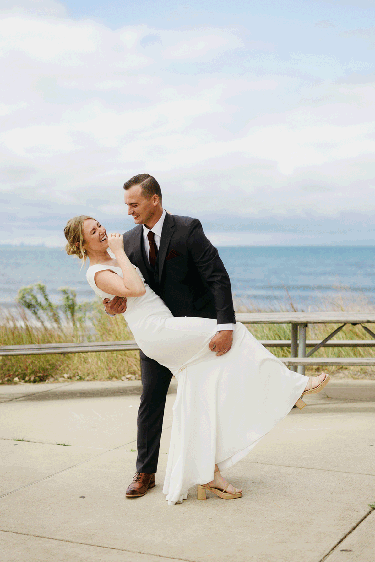 Bride and groom share a first dance during their wedding at Indiana Dunes National Park