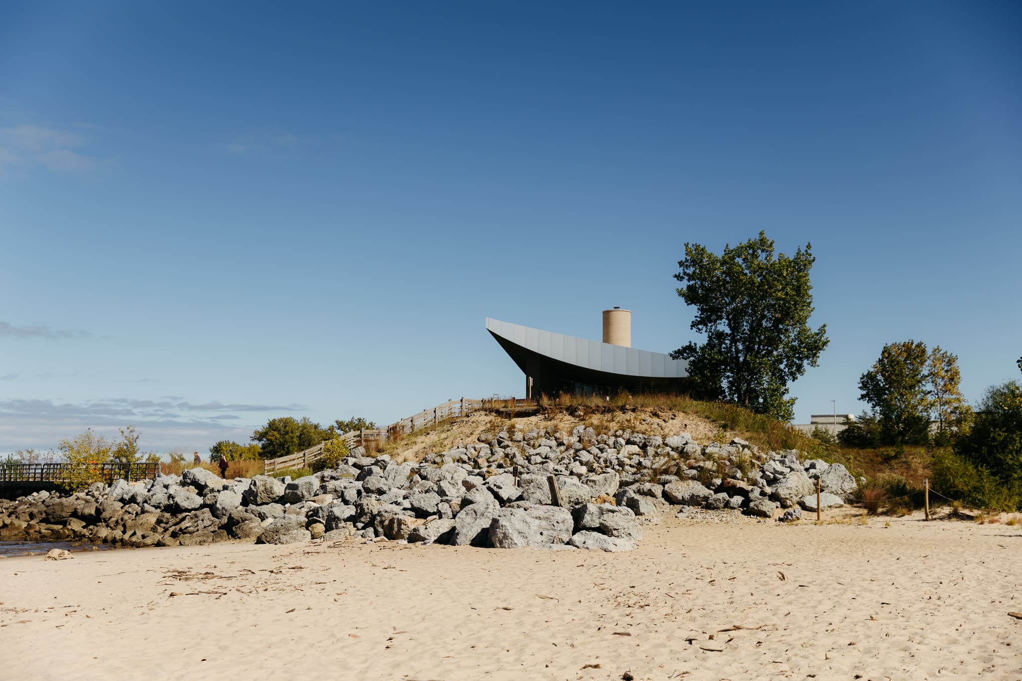 Family and friends set up the Pavilion at Indiana Dunes National Park for a beachside intimate wedding.