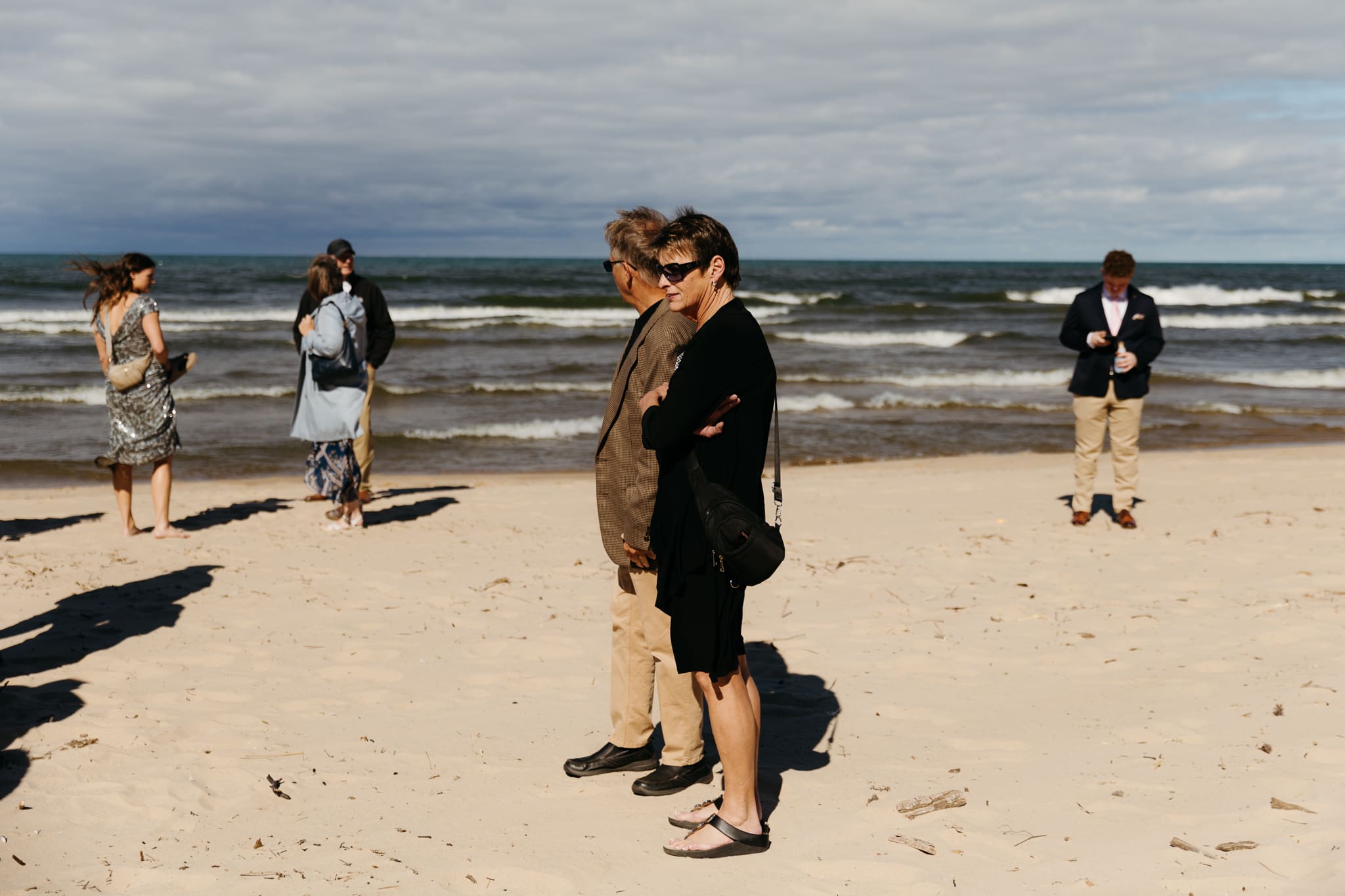 Family and friends gather for an Indiana Dunes National Park beach wedding
