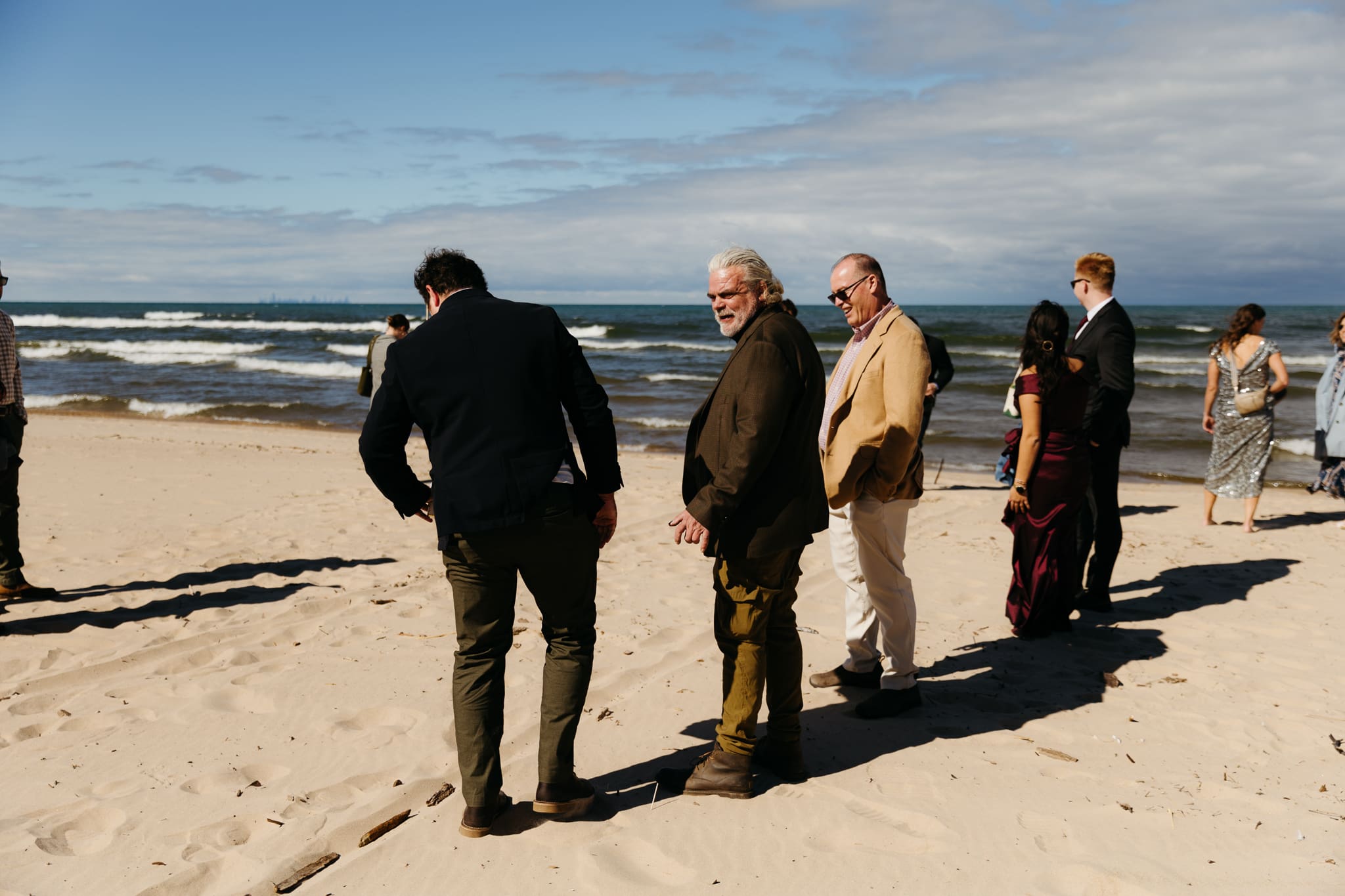Family and friends gather for an Indiana Dunes National Park beach wedding