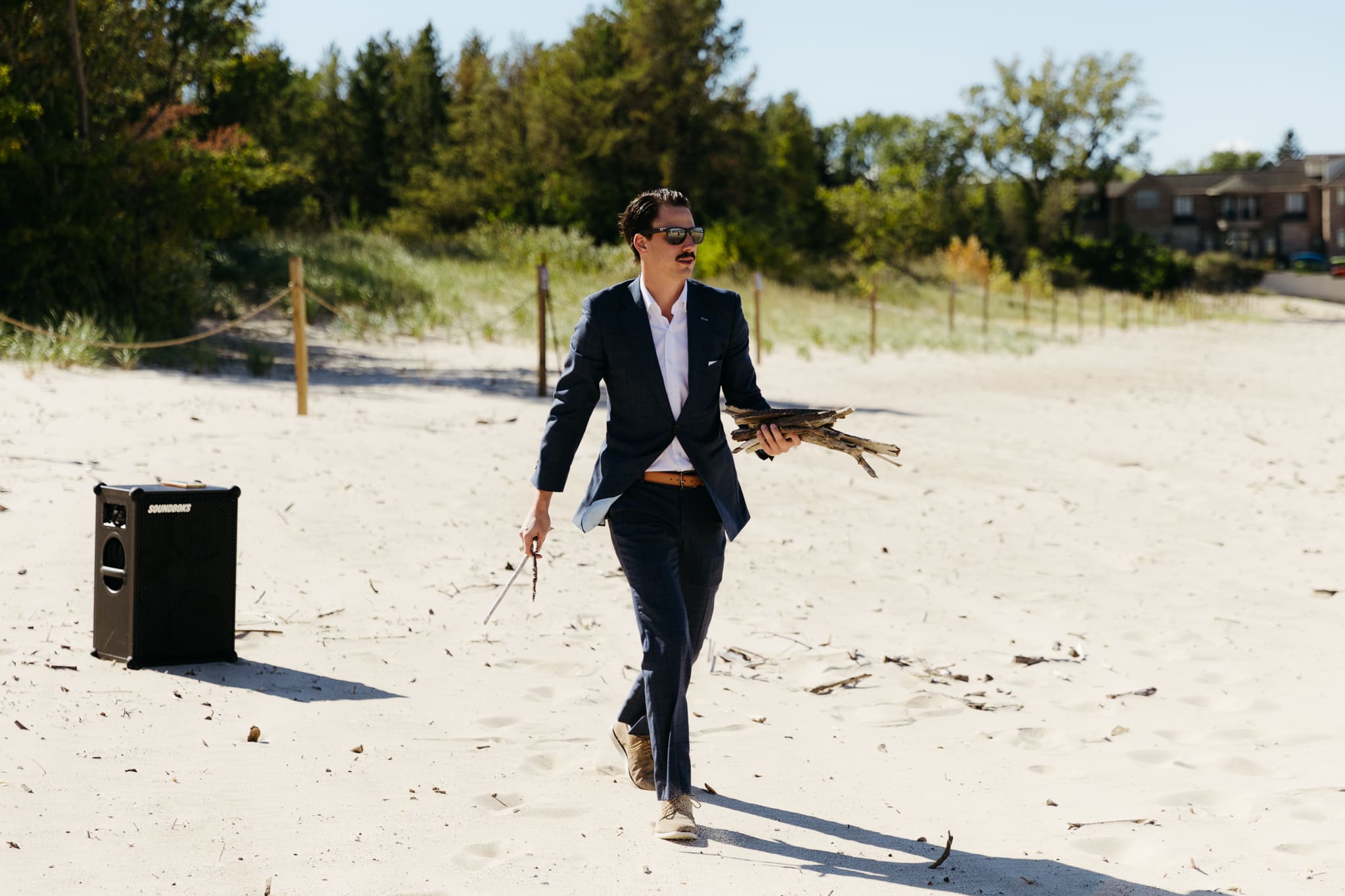 Family and friends gather for an Indiana Dunes National Park beach wedding