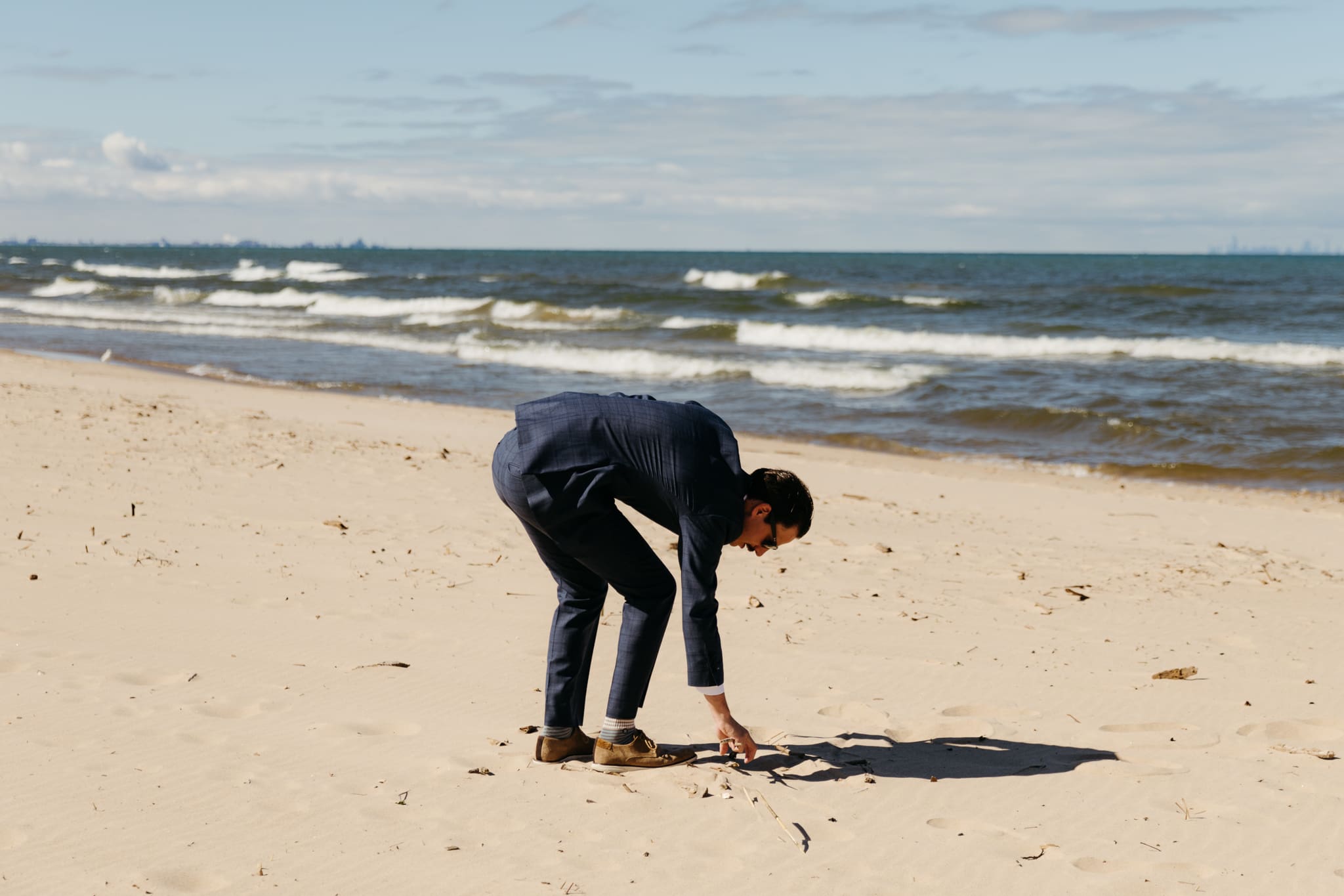 Family and friends gather for an Indiana Dunes National Park beach wedding
