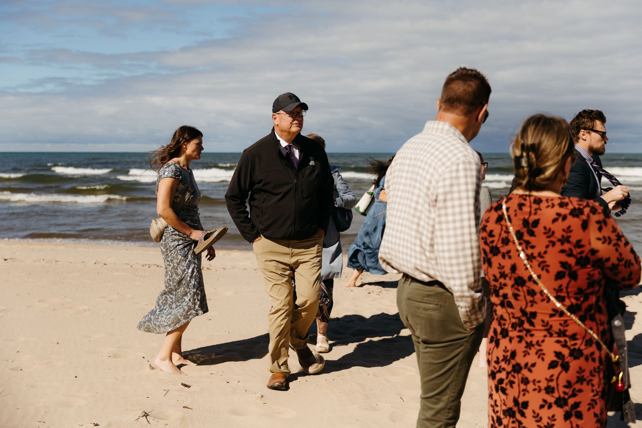 Family and friends gather for an Indiana Dunes National Park beach wedding