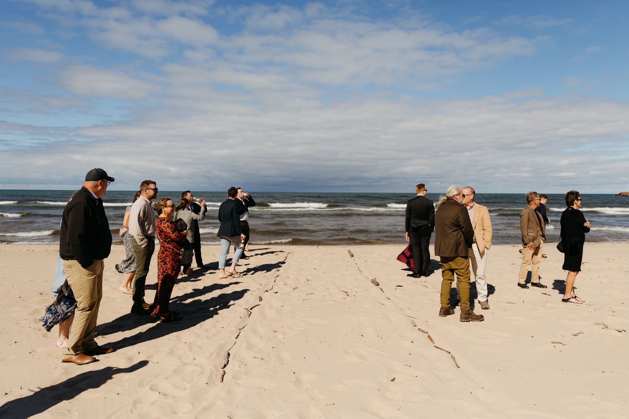 Family and friends gather for an Indiana Dunes National Park beach wedding