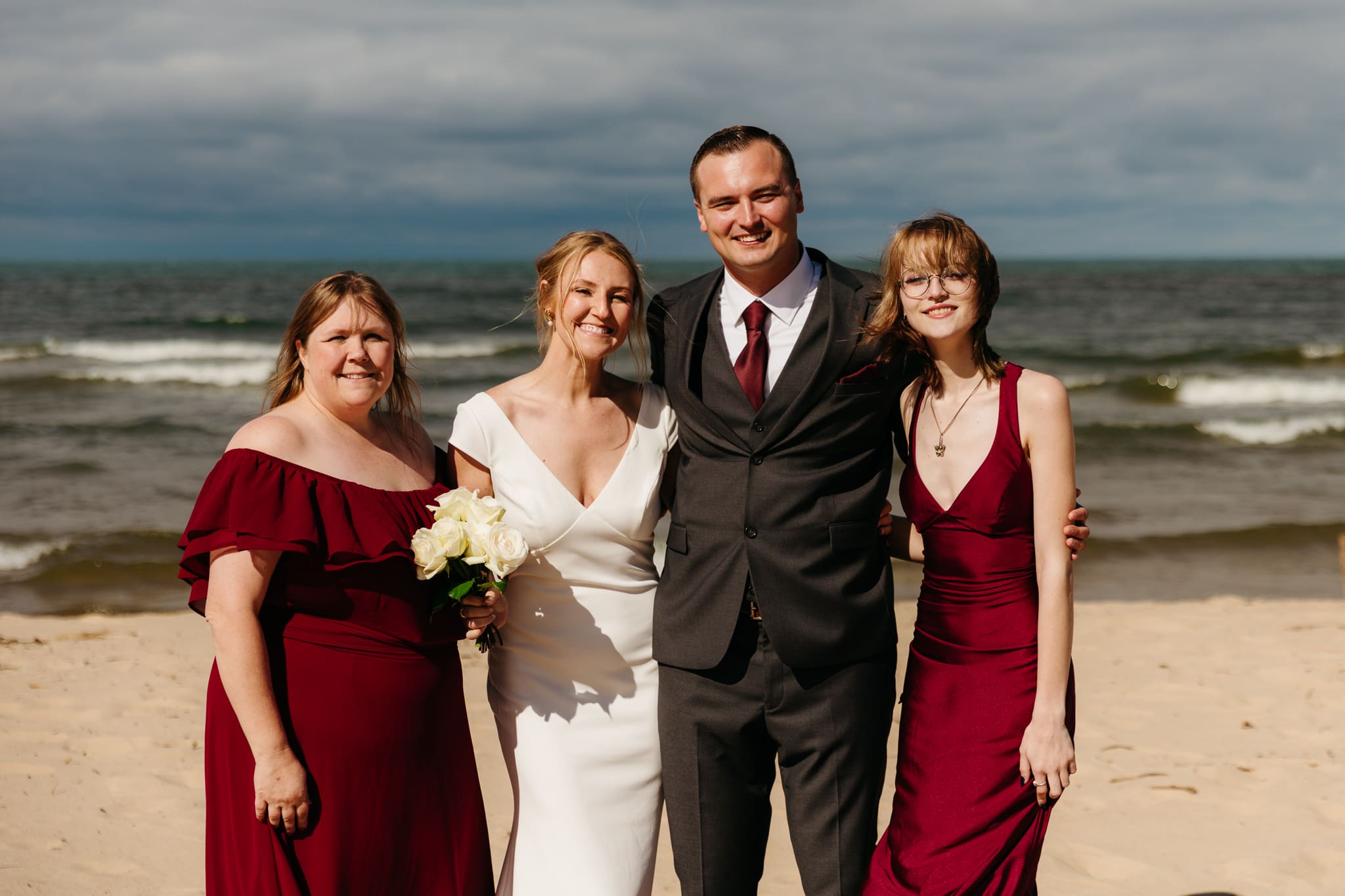 Family and friend group photos at the beach of Lake Michigan for a wedding at Indiana Dunes National Park