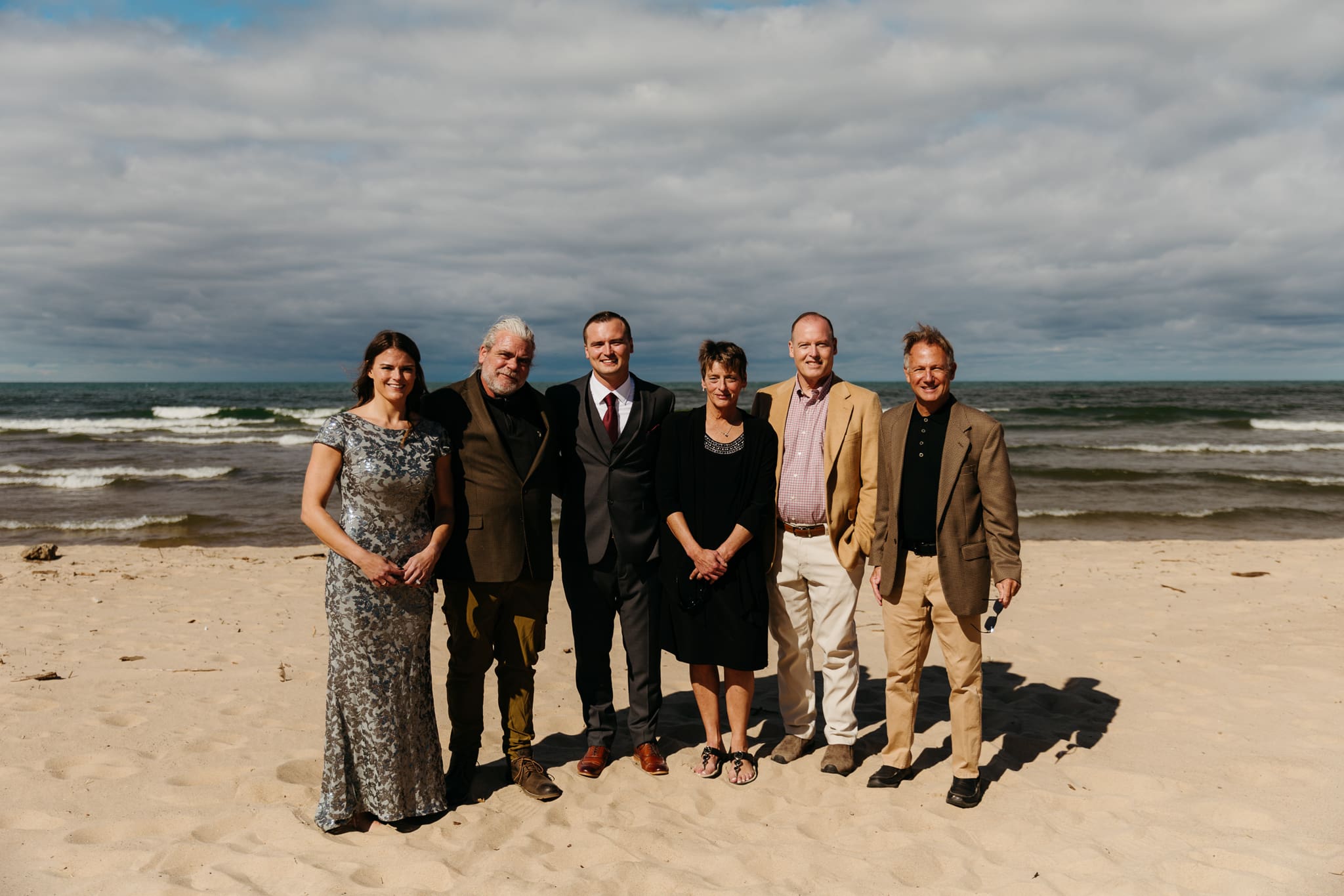 Family and friend group photos at the beach of Lake Michigan for a wedding at Indiana Dunes National Park