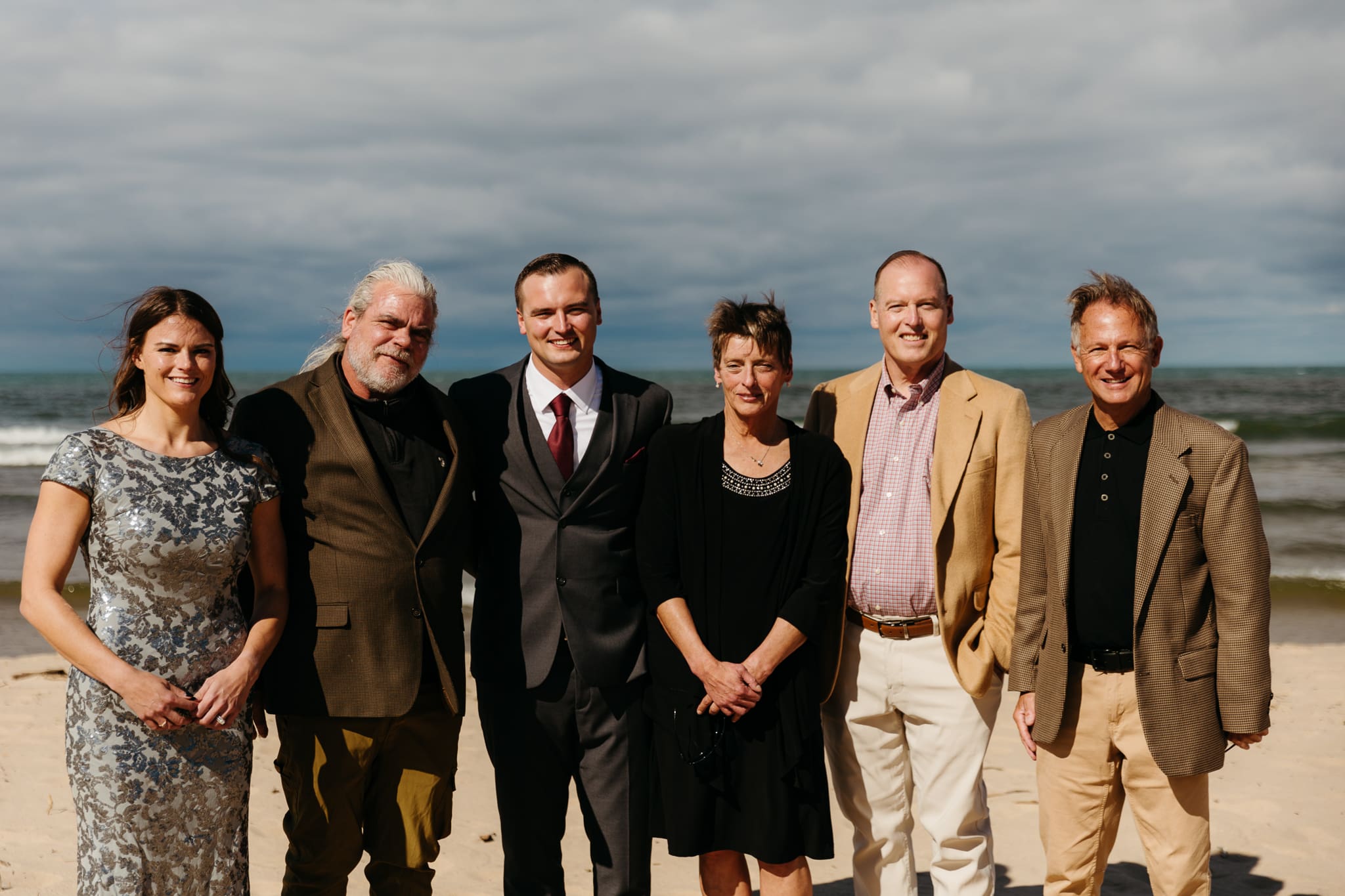Family and friend group photos at the beach of Lake Michigan for a wedding at Indiana Dunes National Park