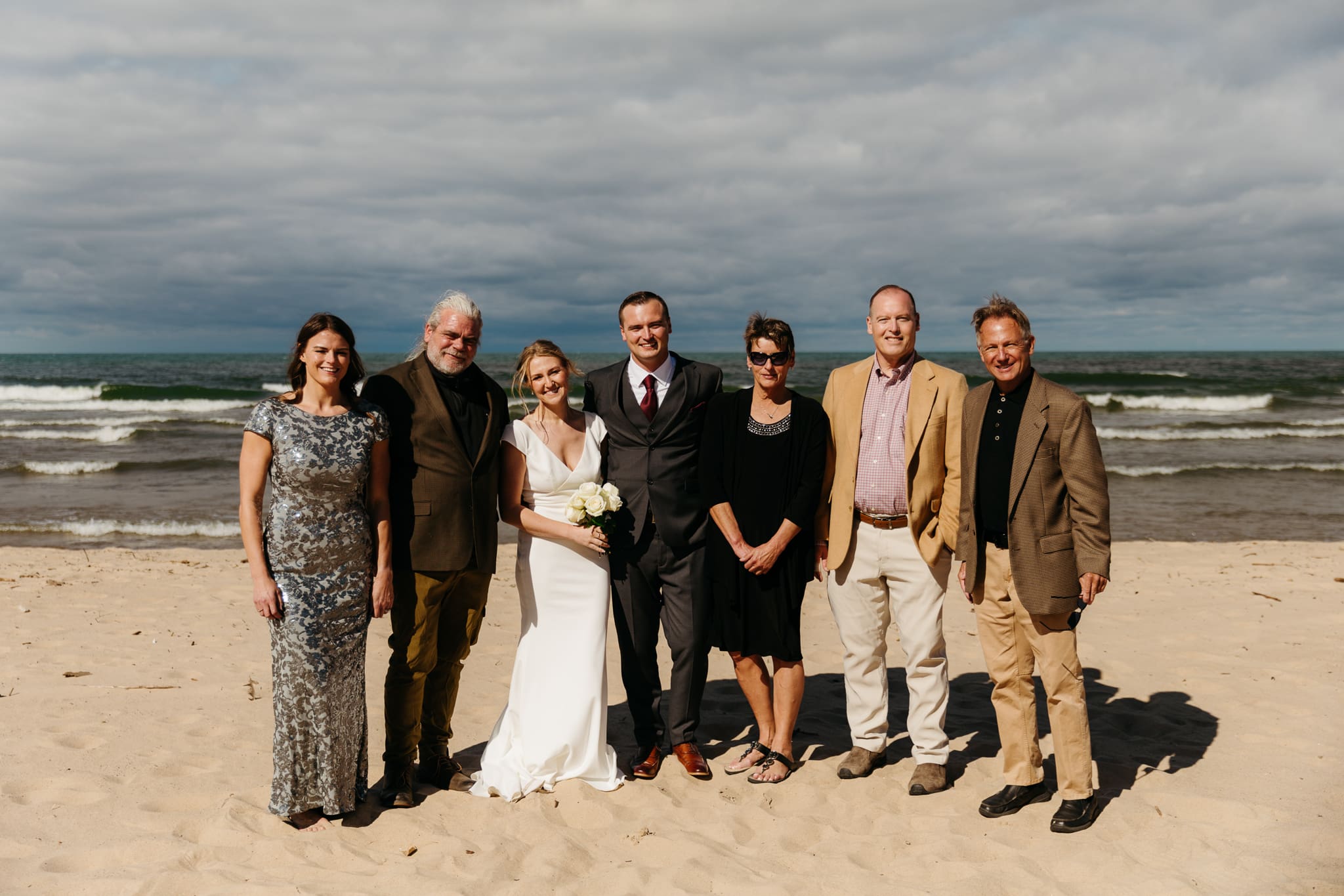 Family and friend group photos at the beach of Lake Michigan for a wedding at Indiana Dunes National Park