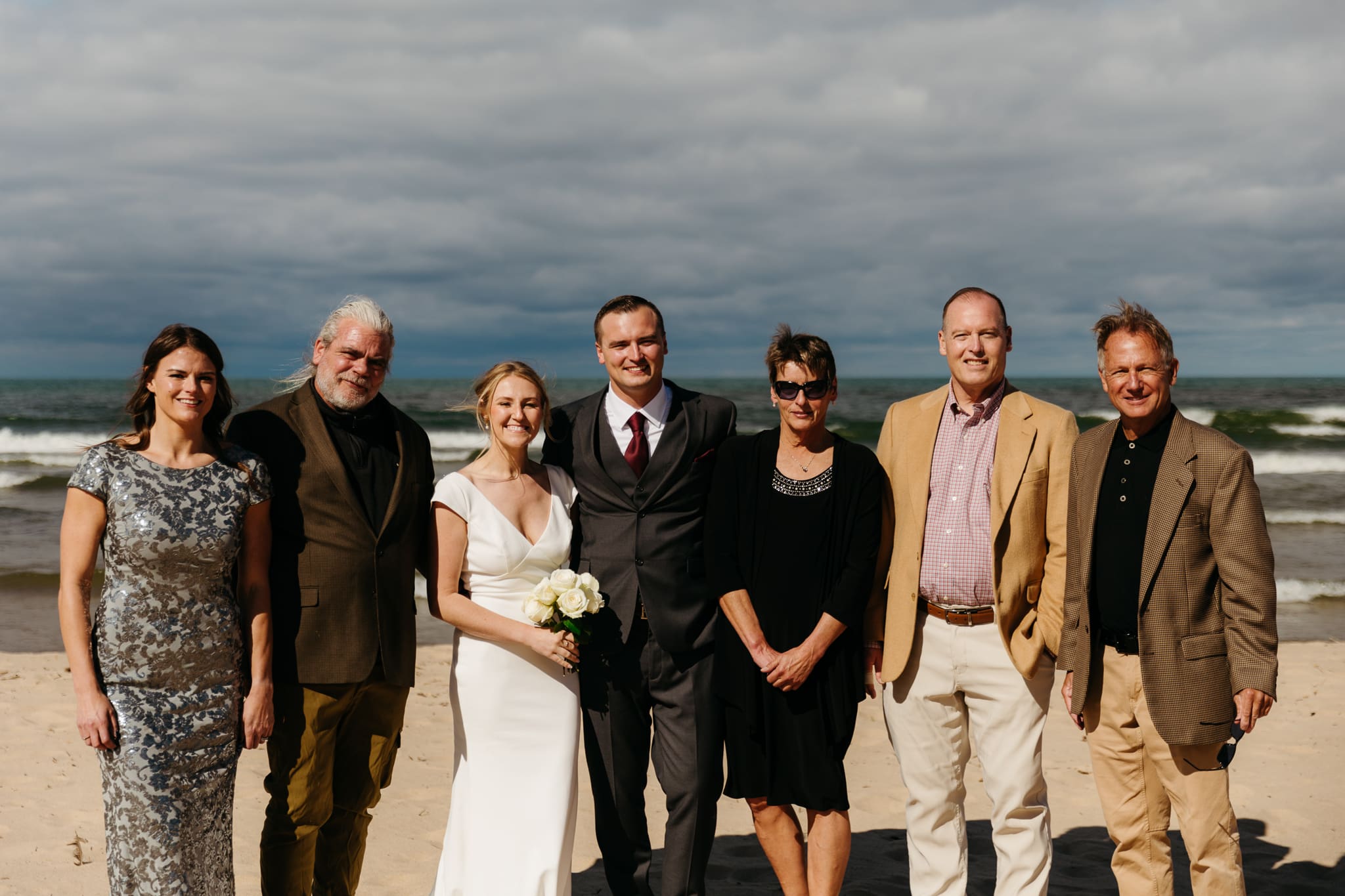 Family and friend group photos at the beach of Lake Michigan for a wedding at Indiana Dunes National Park